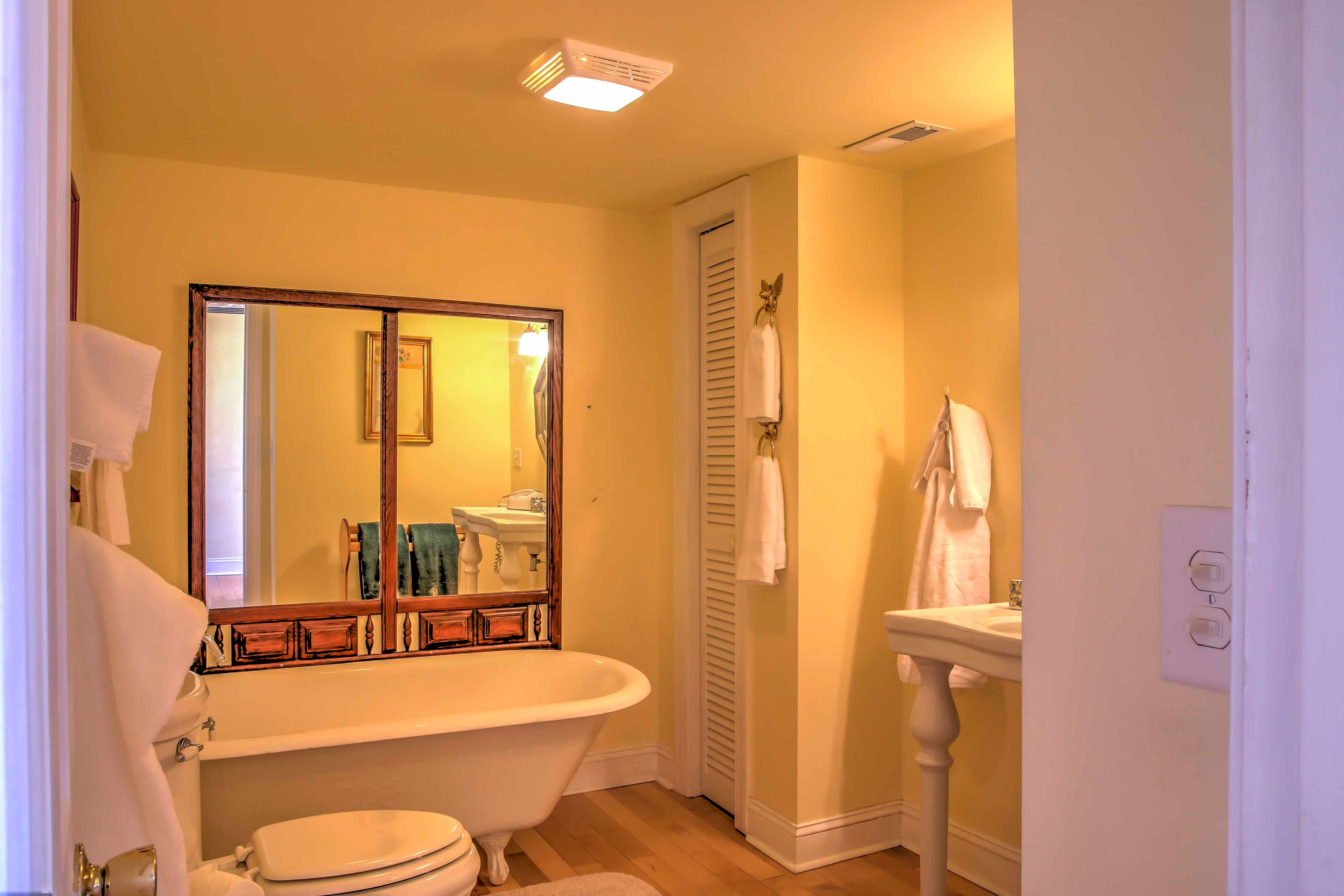 A Clawfoot tub highlights this bathroom.