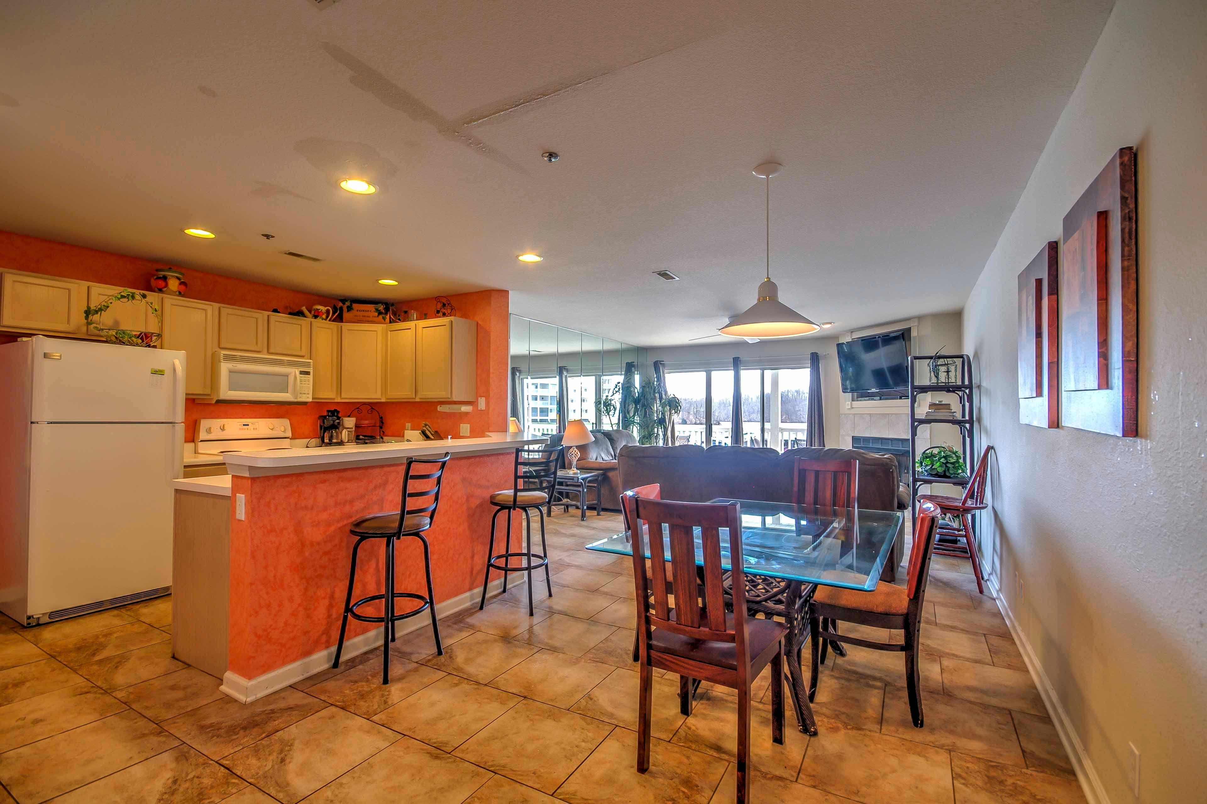 Enjoy meals at the dining table with seating for 4!