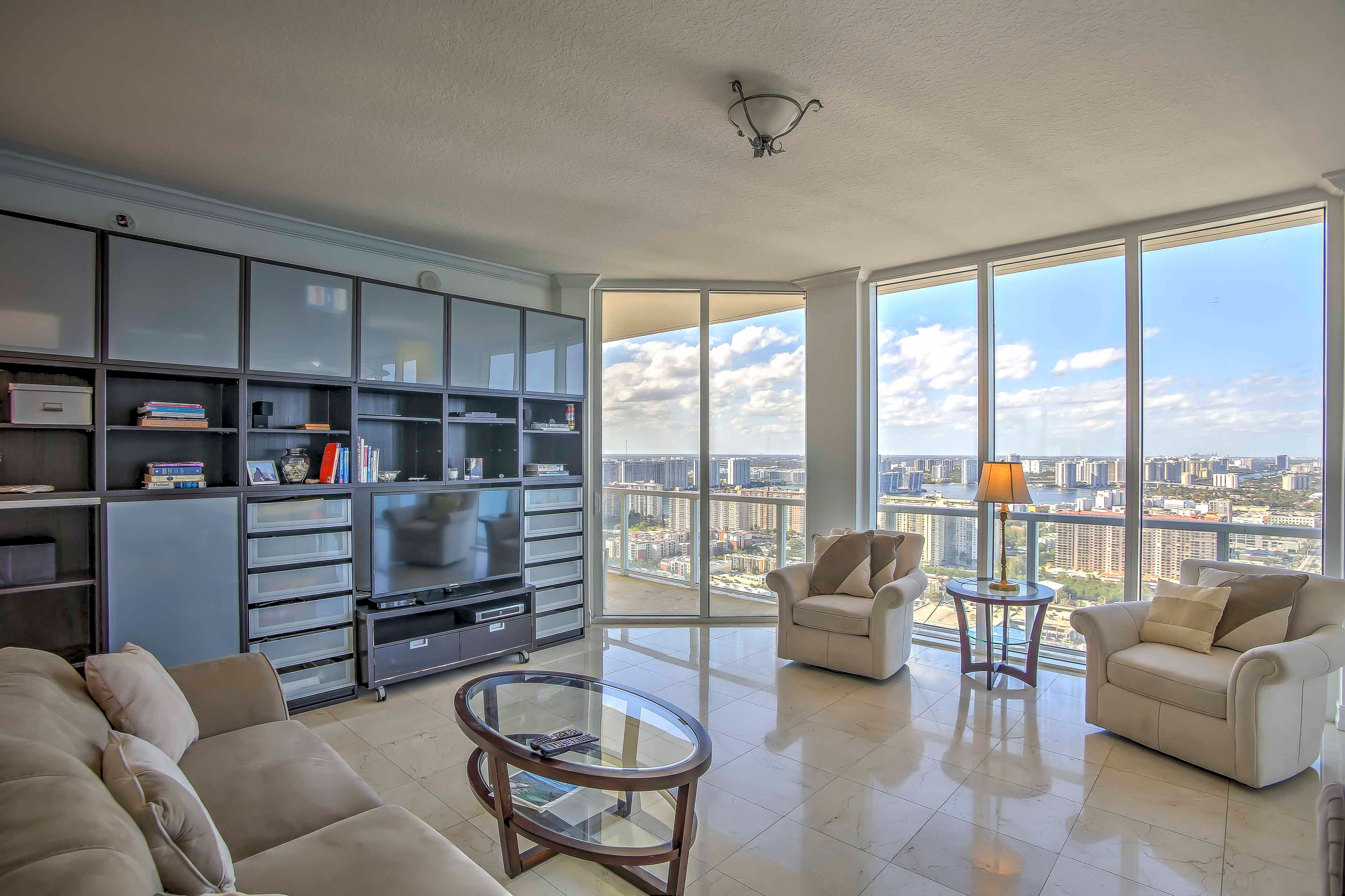 The condo features 4 bedrooms and 5.5 bathrooms.