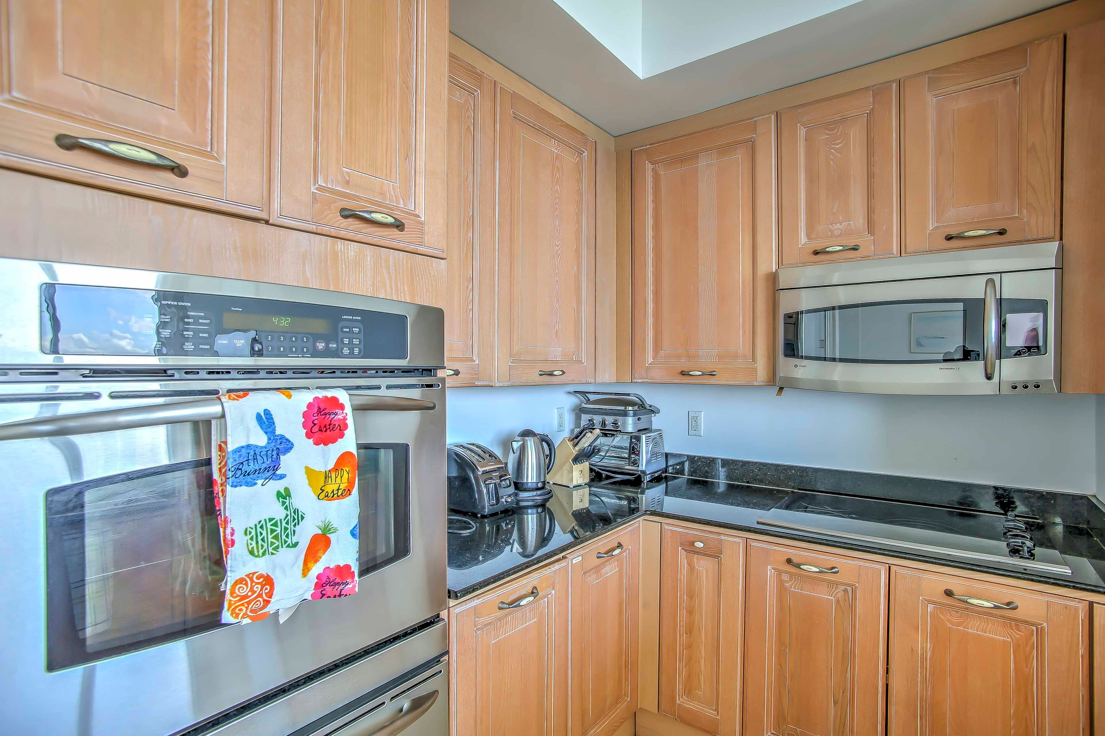 The kitchen features stainless steel appliances.