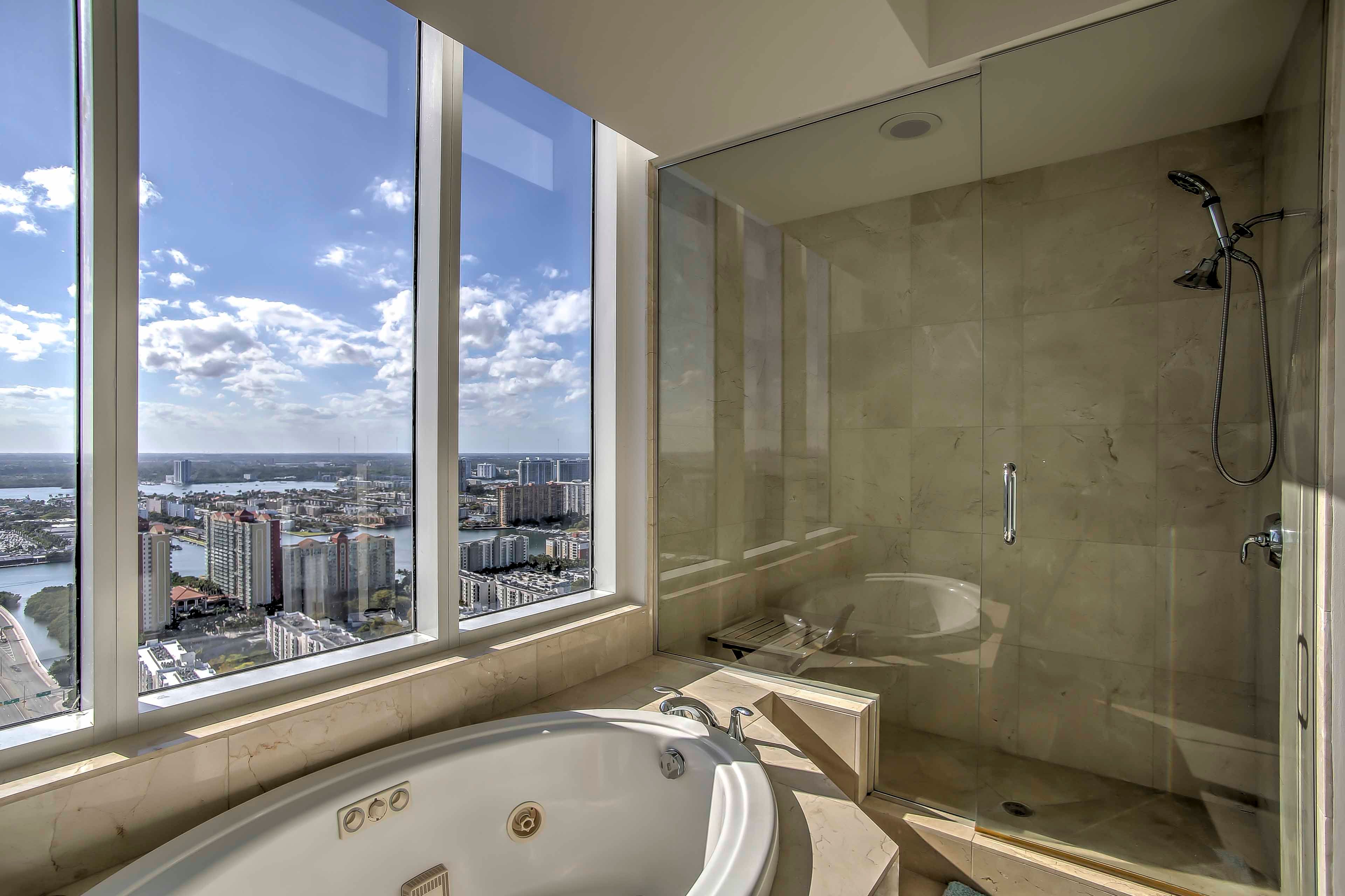 Rinse off in the glass walk-in shower.