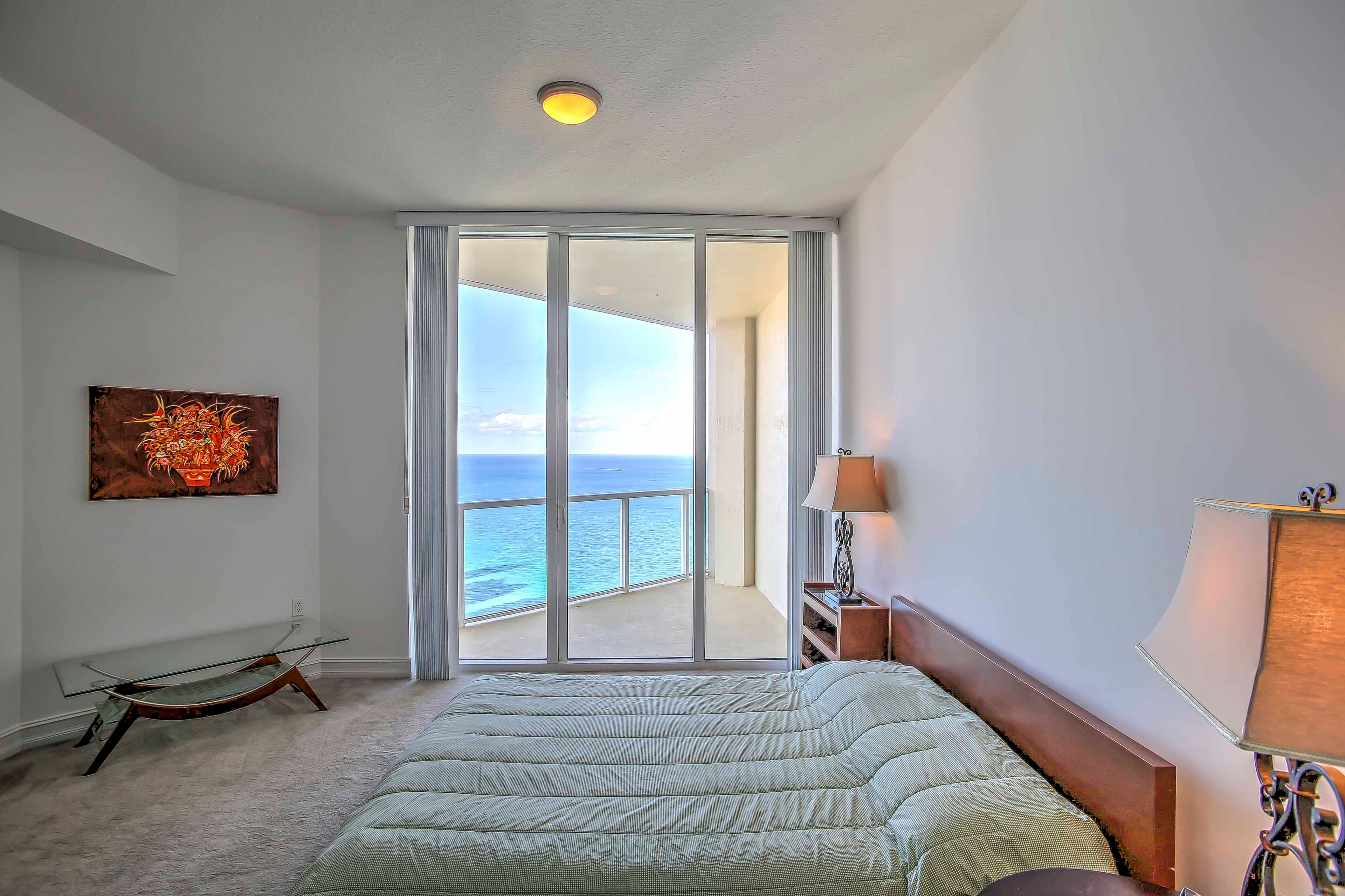 Open the sliding glass door and listen to the waves rolling in.