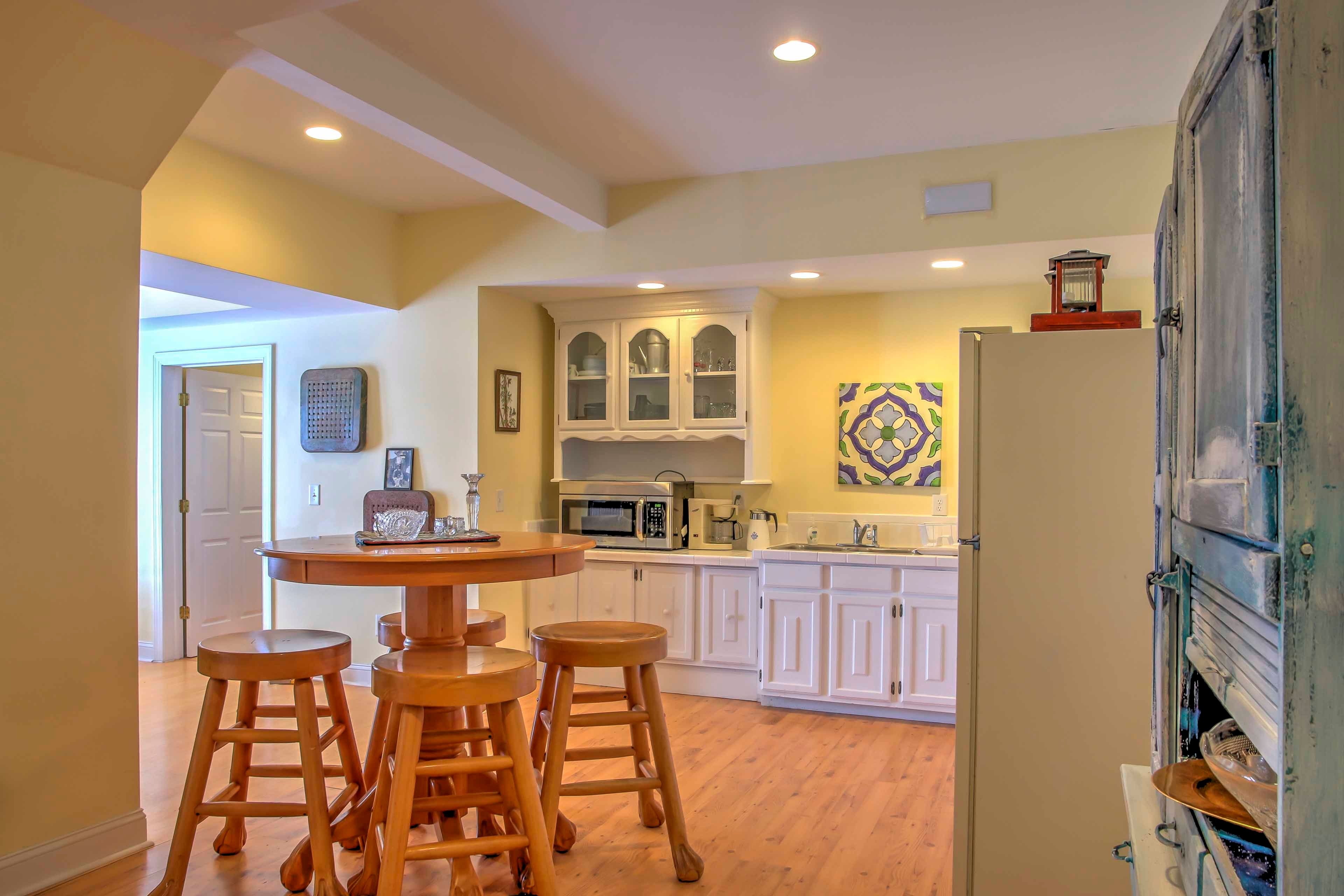 Pull up a bar stool to enjoy your meals at the high dining table.