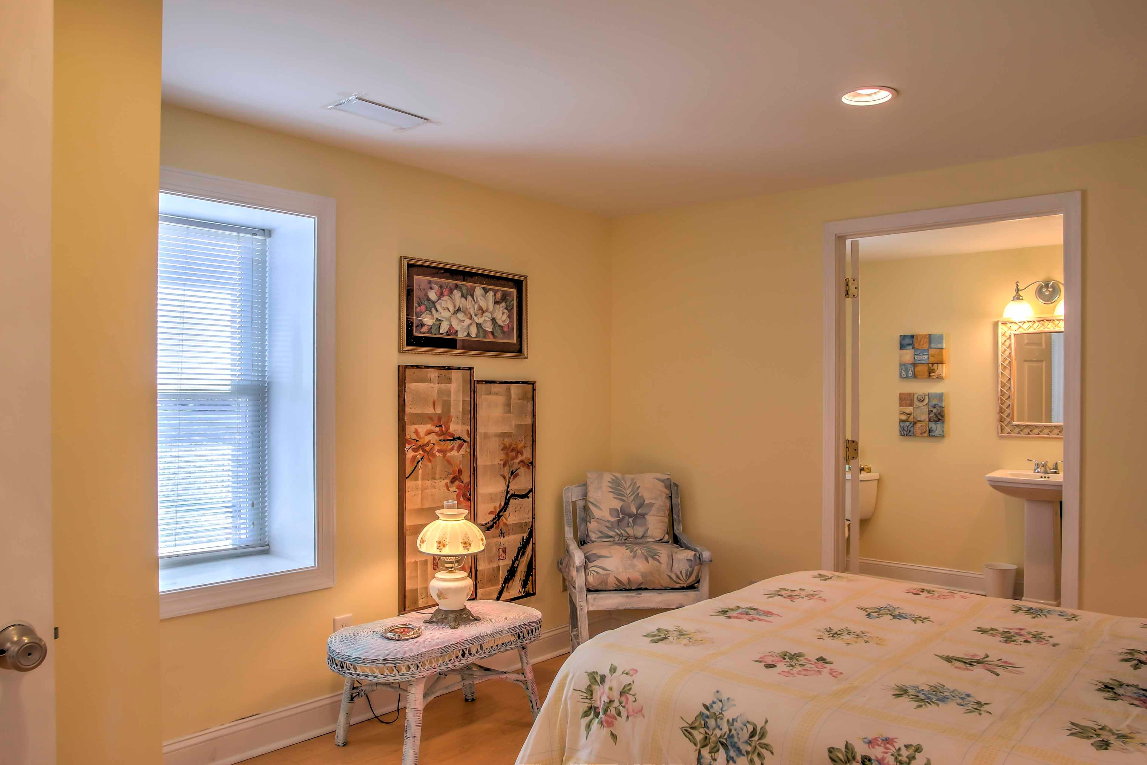 The tasteful decor extends into the bedroom.