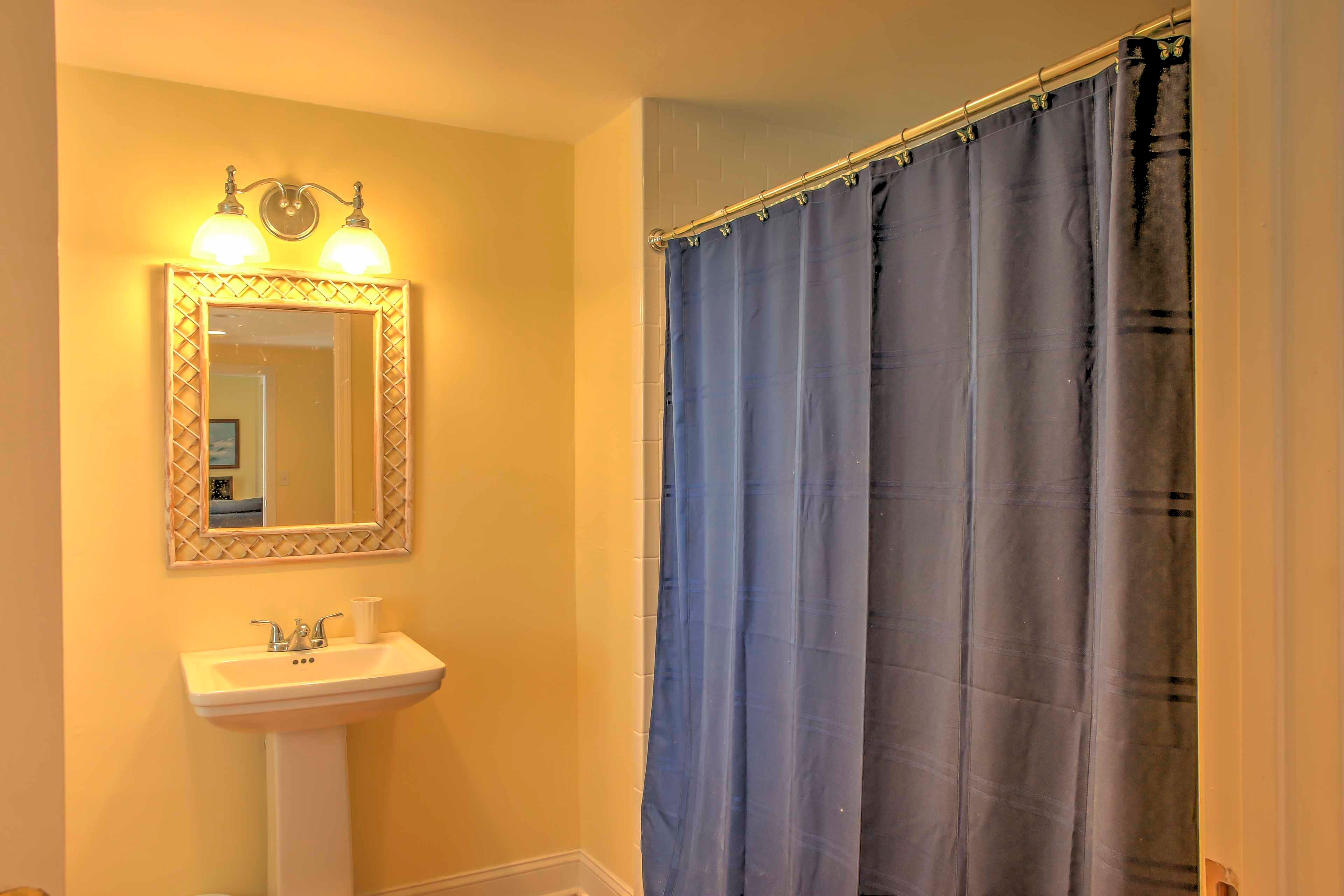 Freshen up in the pristine bathroom.