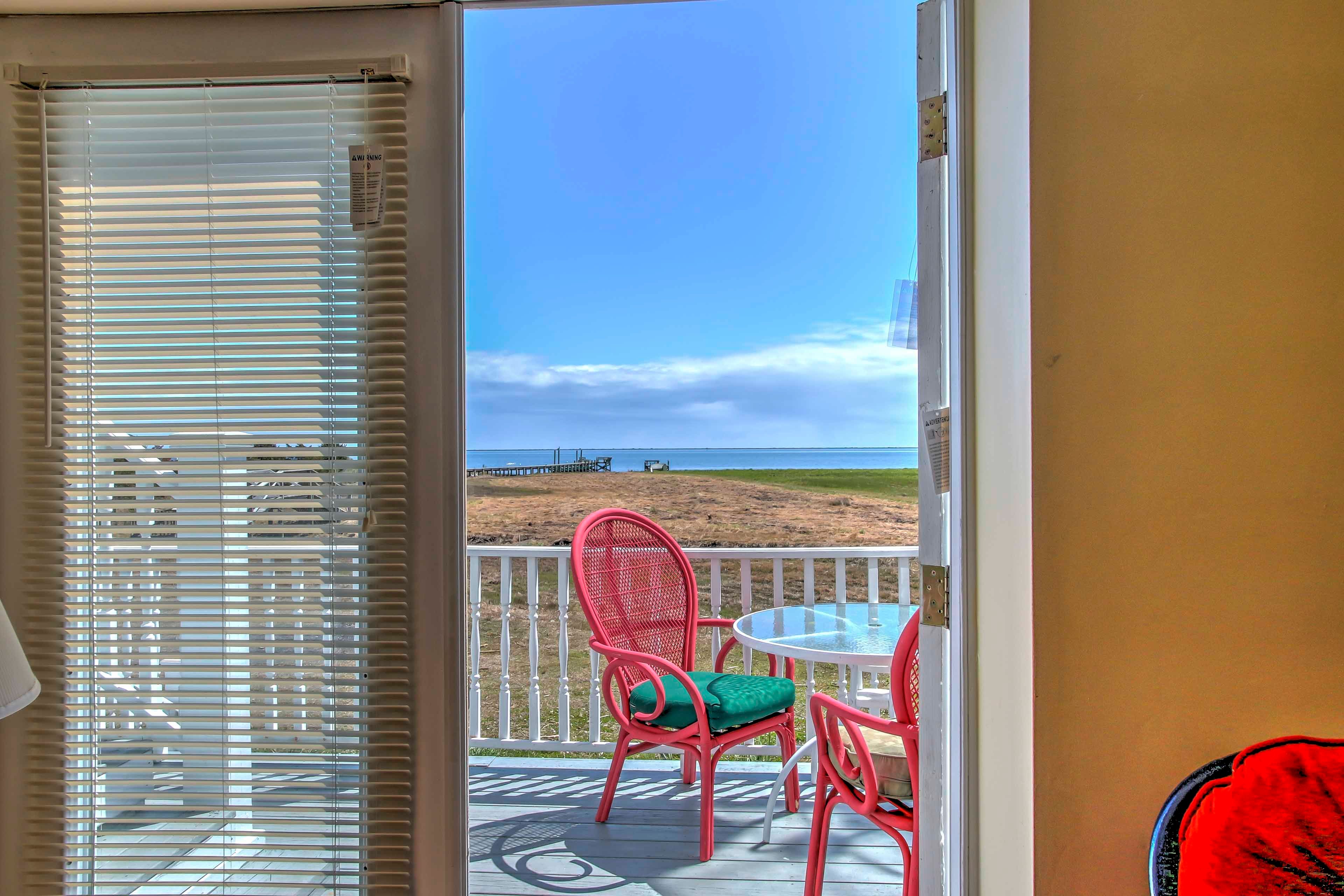 Step out onto the balcony to enjoy the fresh air and scenery.