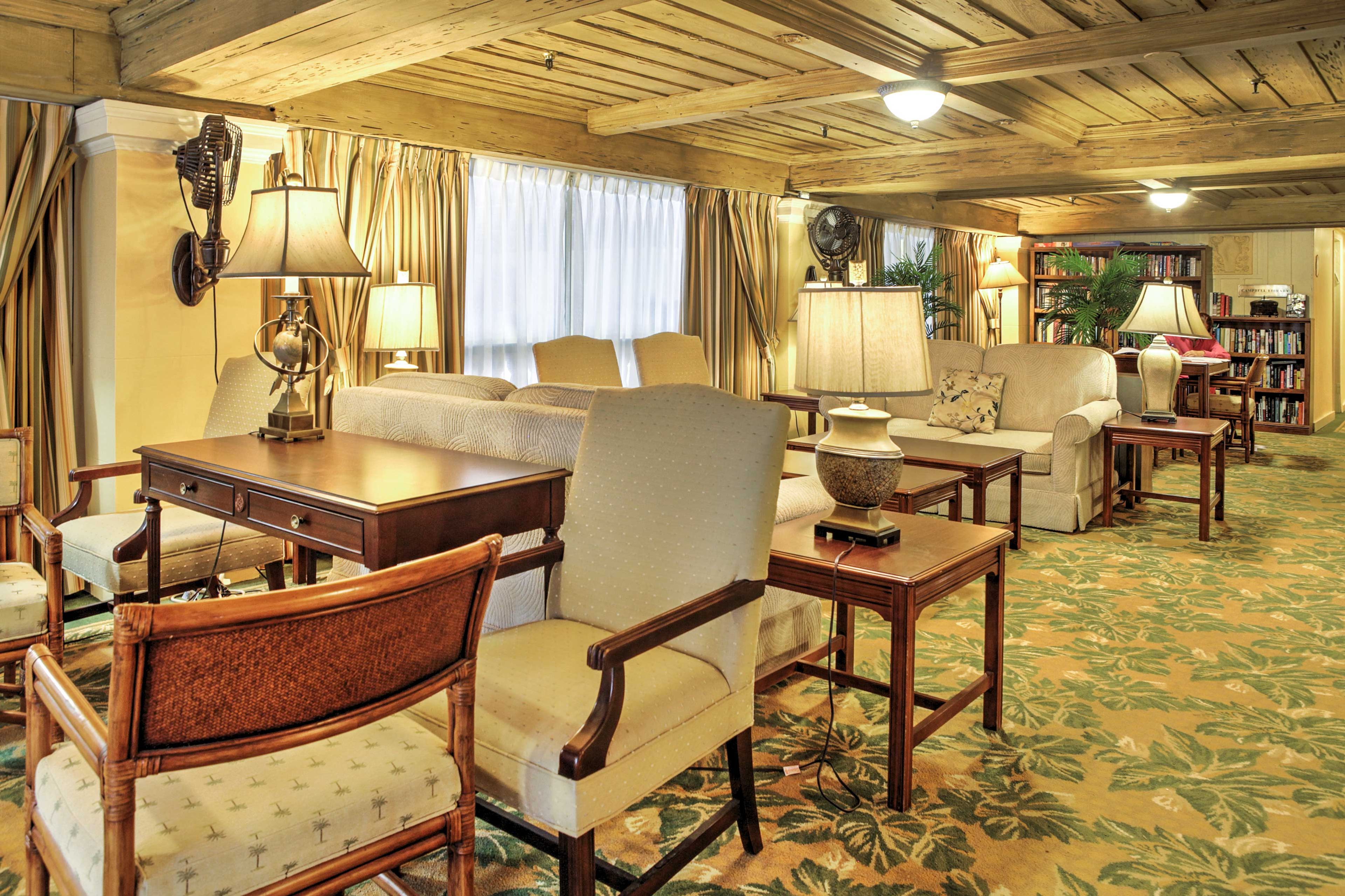 Enjoy your quiet downtime in the hotel's elegant lobby and library space.