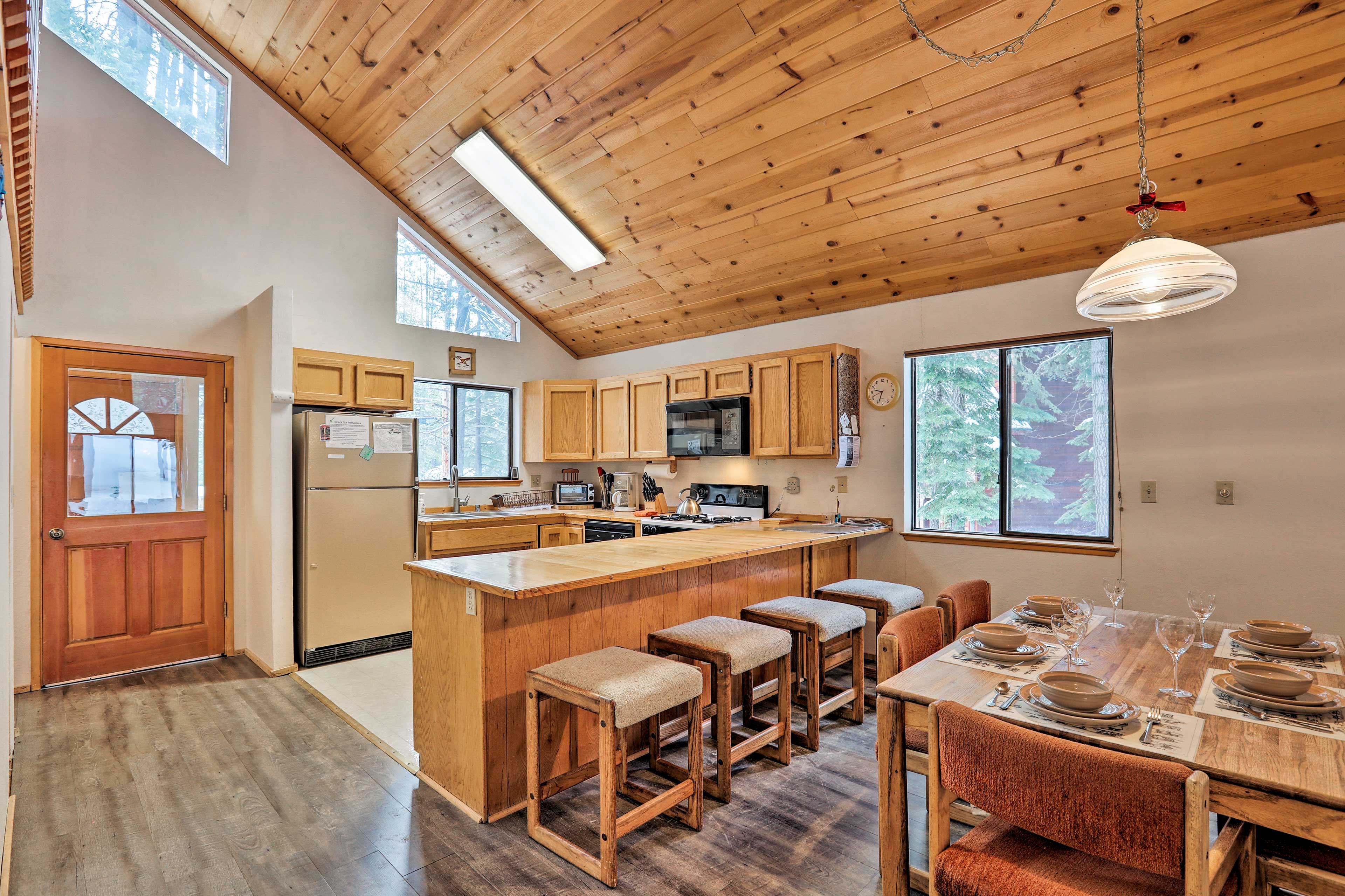 Enjoy home-cooked meals at the dining table or kitchen bar.