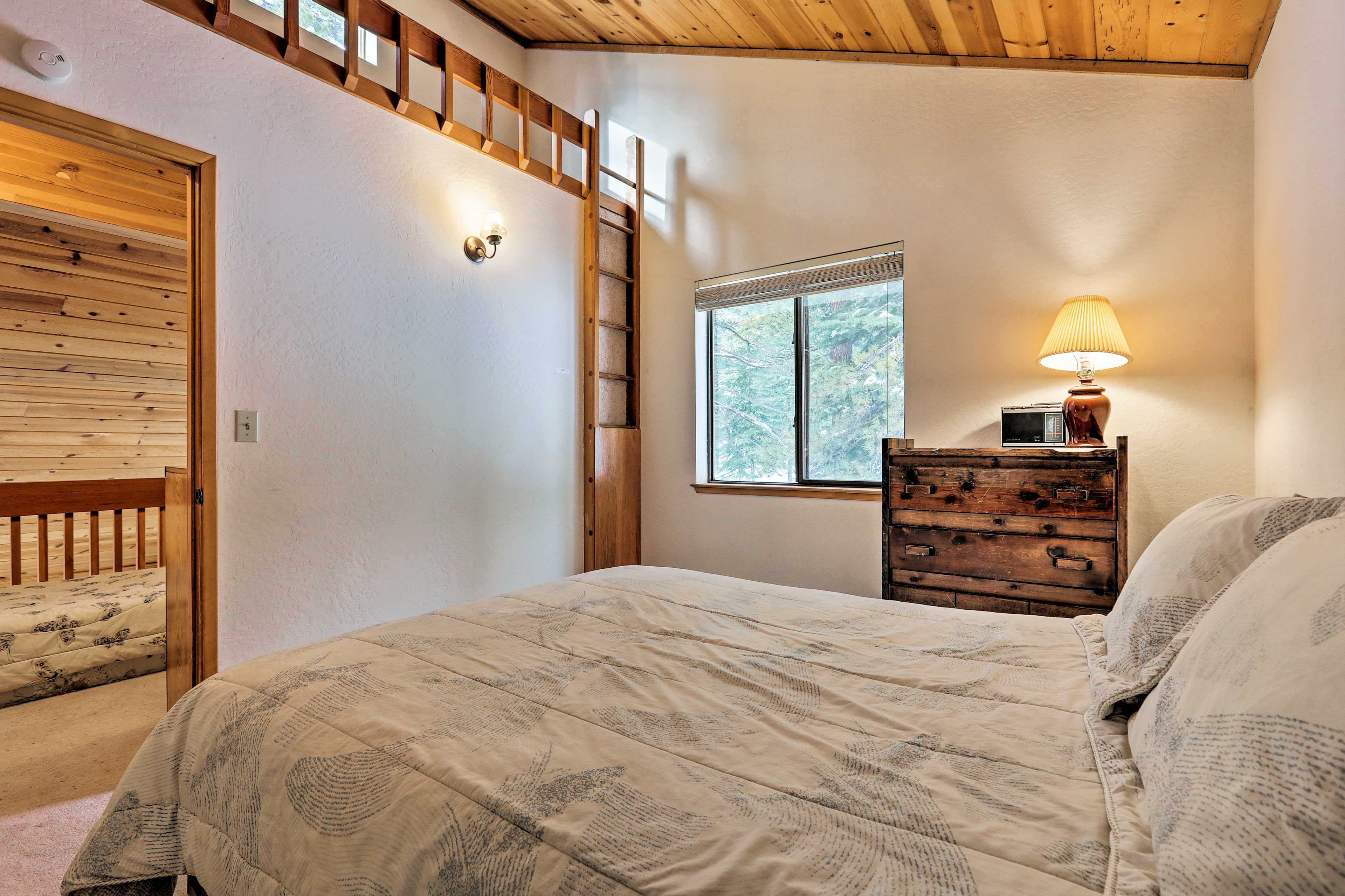 This bedroom includes a queen bed.