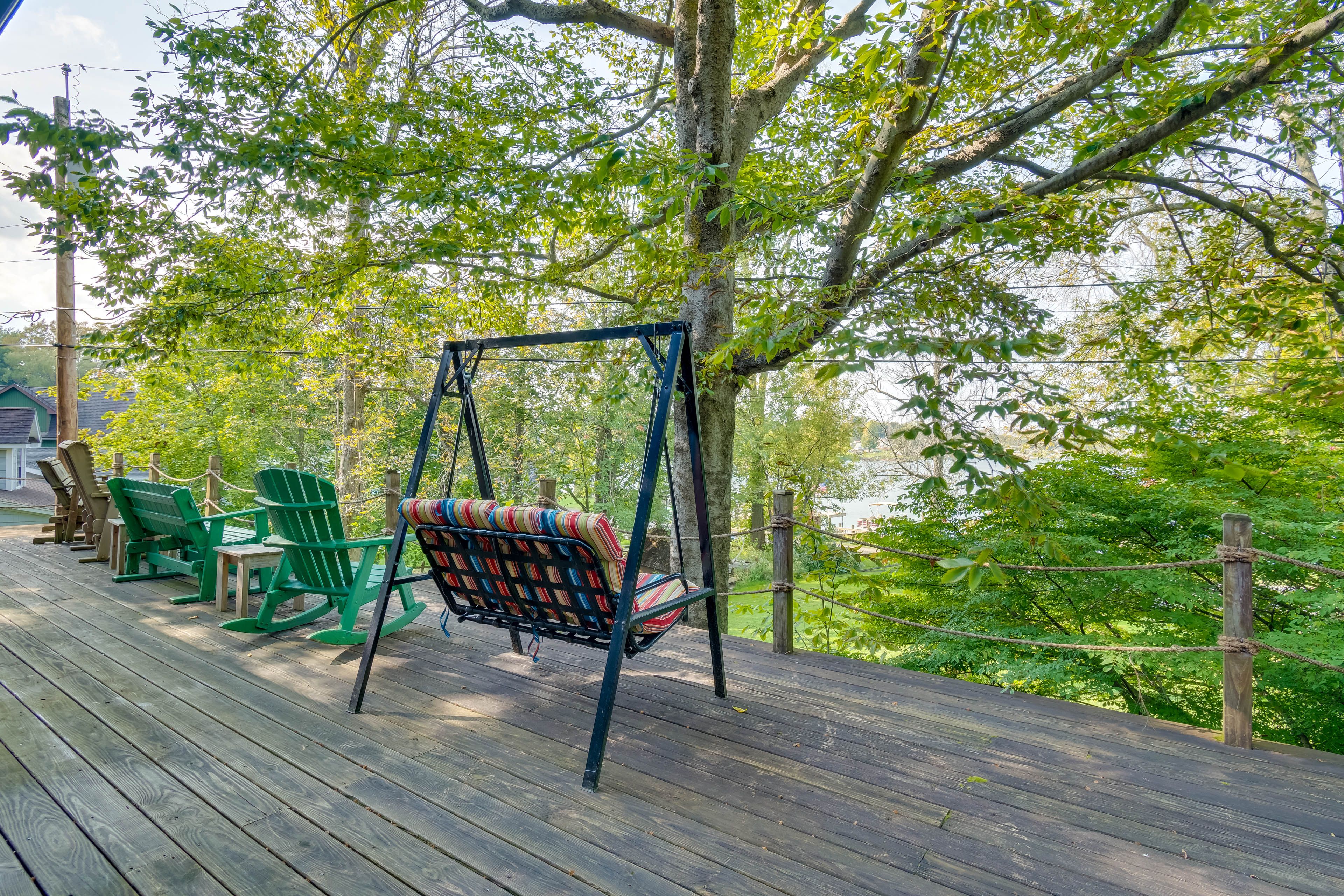 Spacious Deck | Swing | Seating | Lake Views | Outdoor Dining