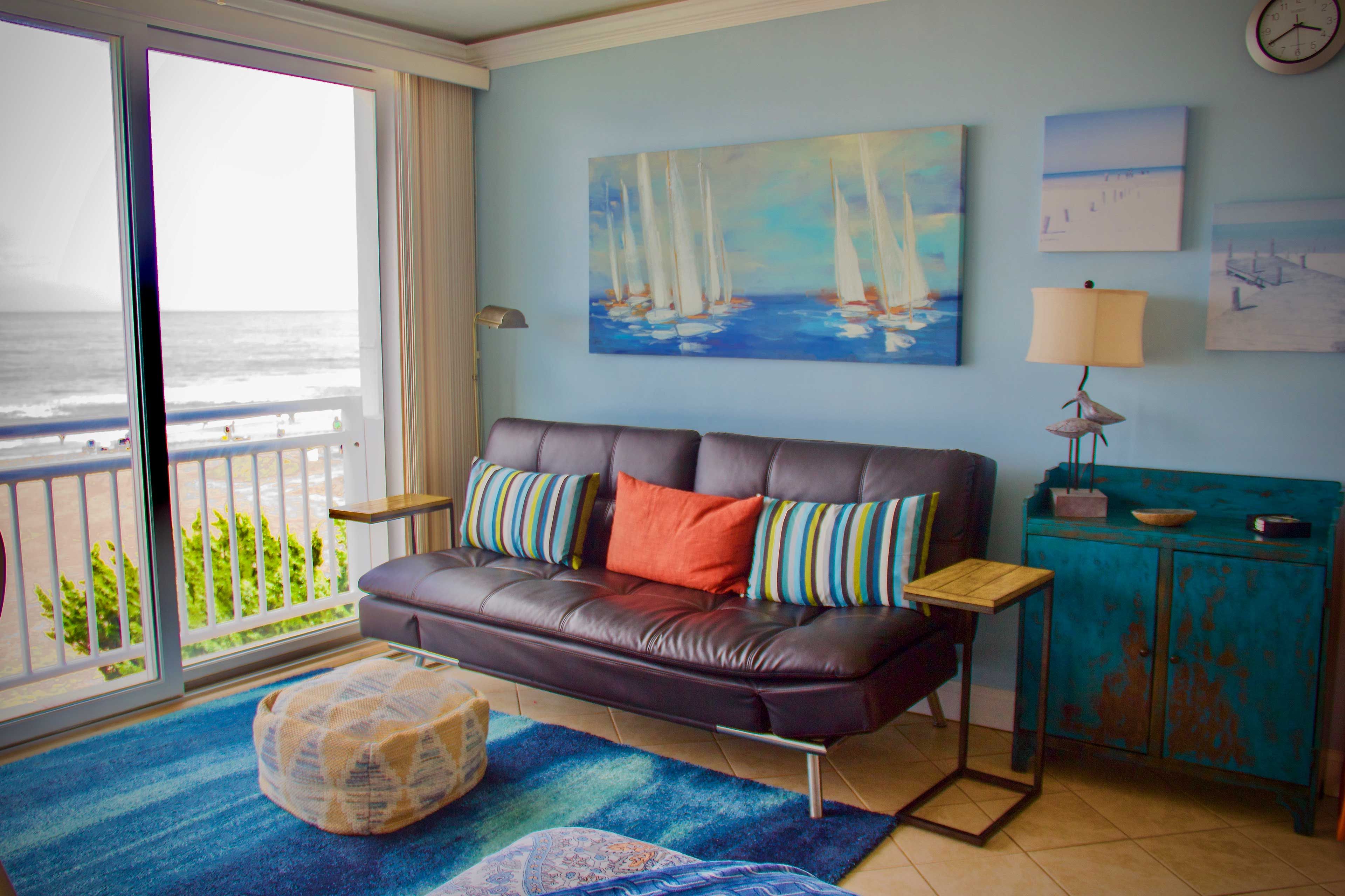 Kick back and enjoy waterfront views inside & out!
