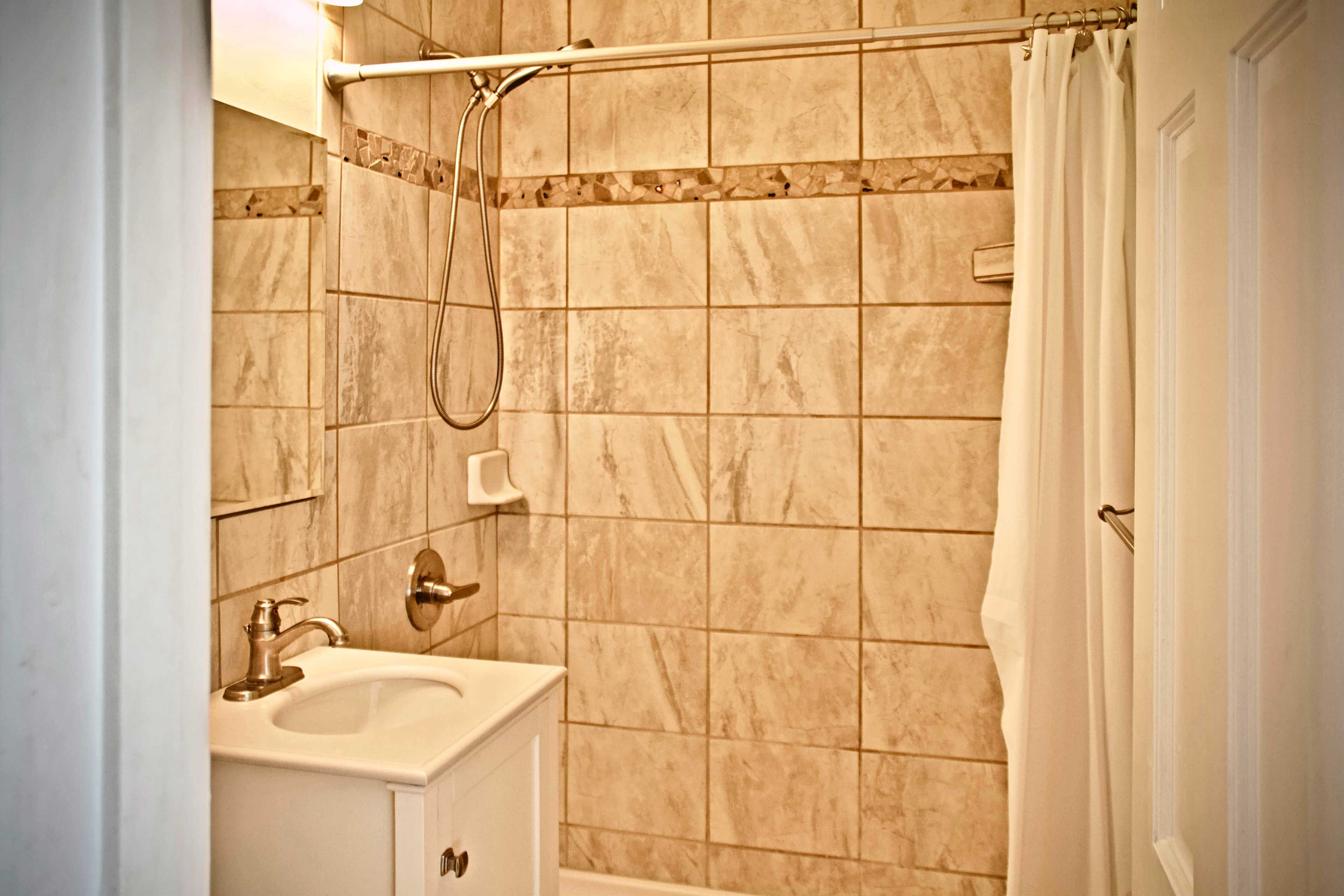 The bathroom is all tile!