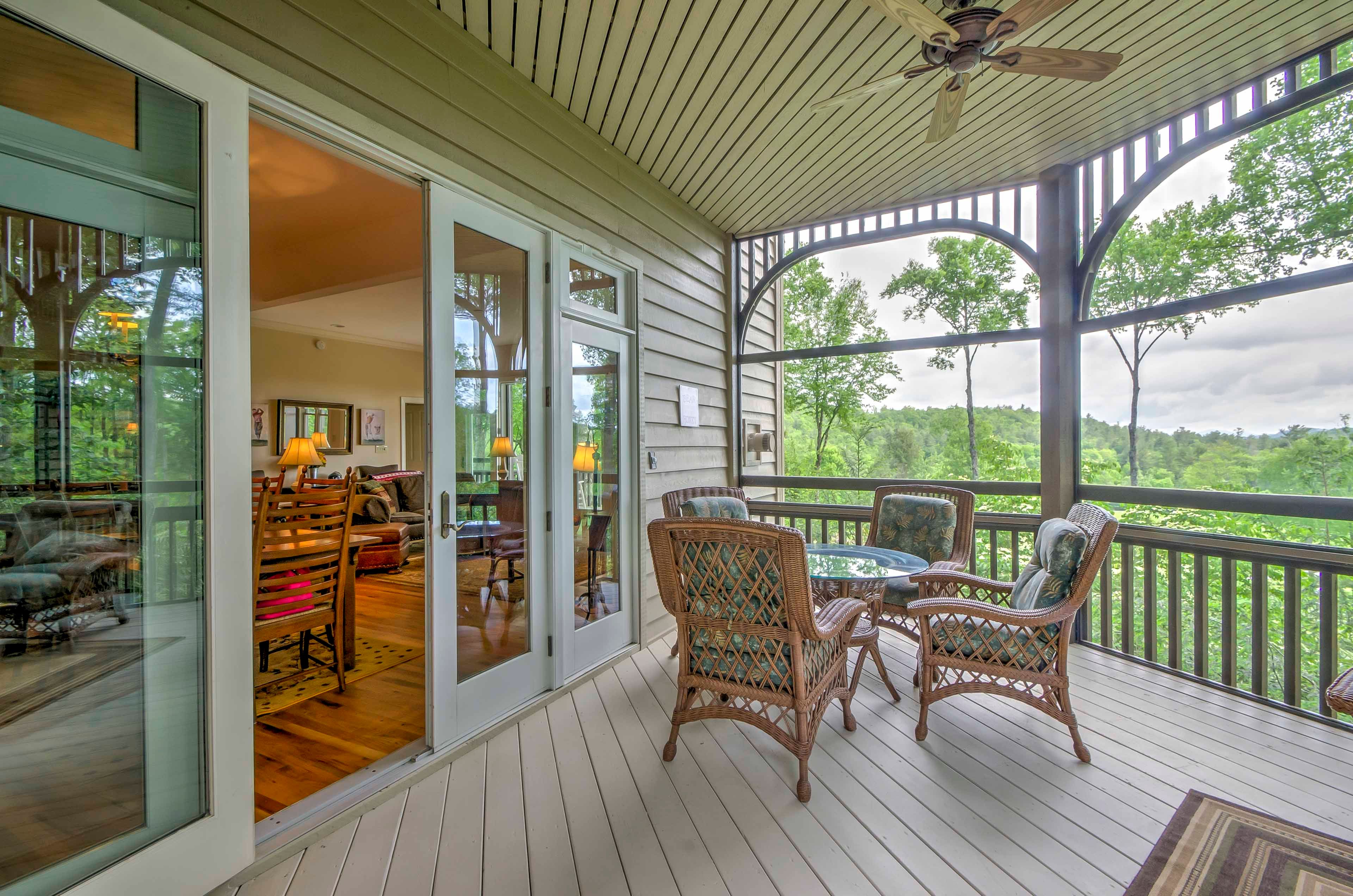 Enjoy your favorite beverage on the screened-in porch while admiring the mountain views.