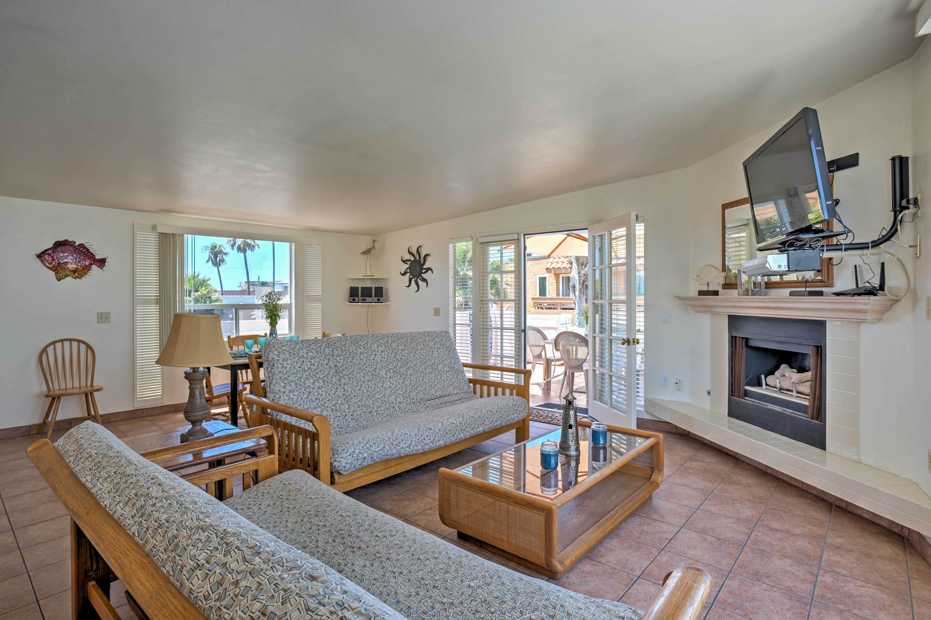 The living room features 2 futons that  double as extra sleeping accommodation.