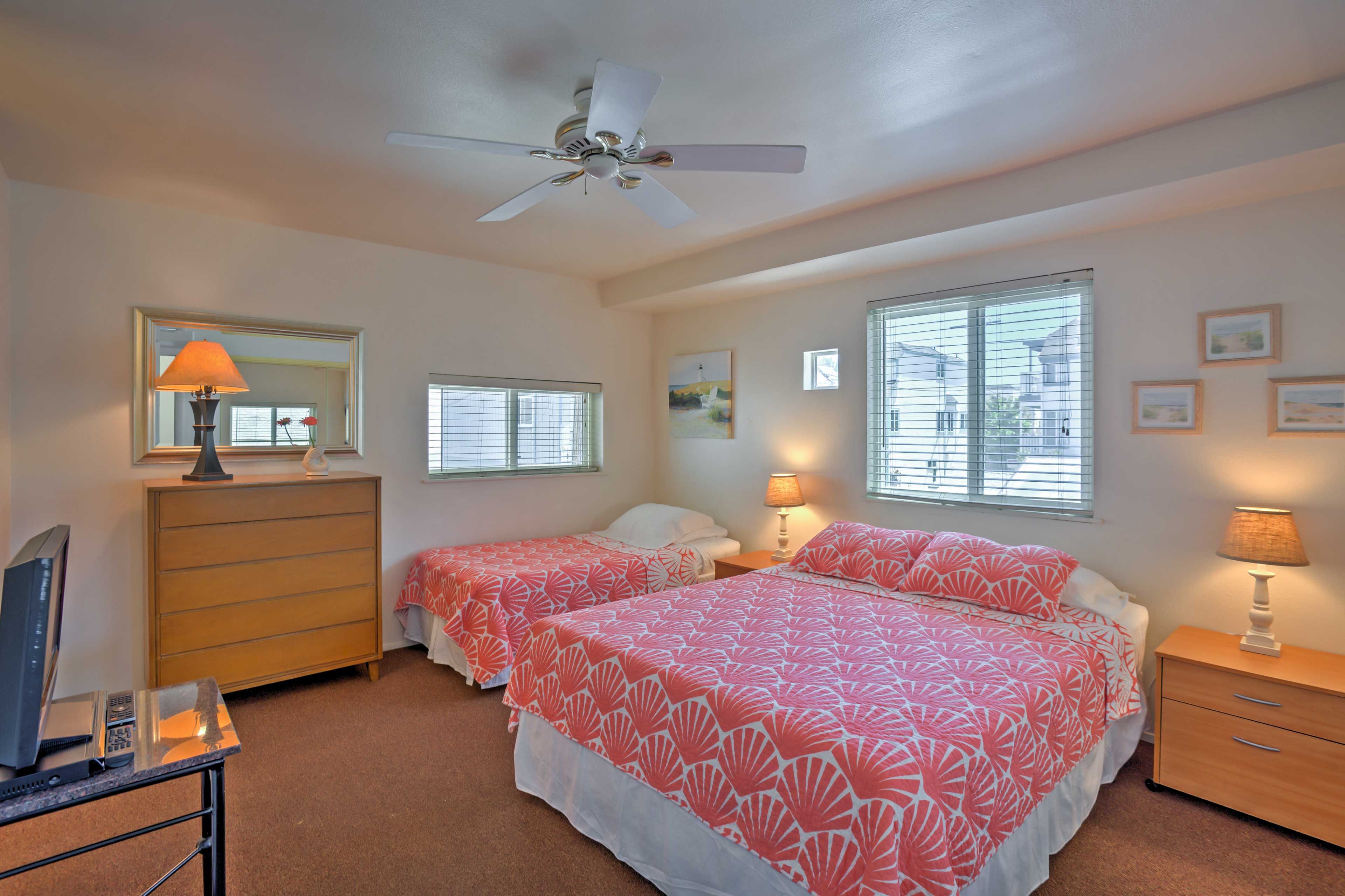 Fall fast asleep atop the queen and twin-sized beds in the 2nd bedroom.