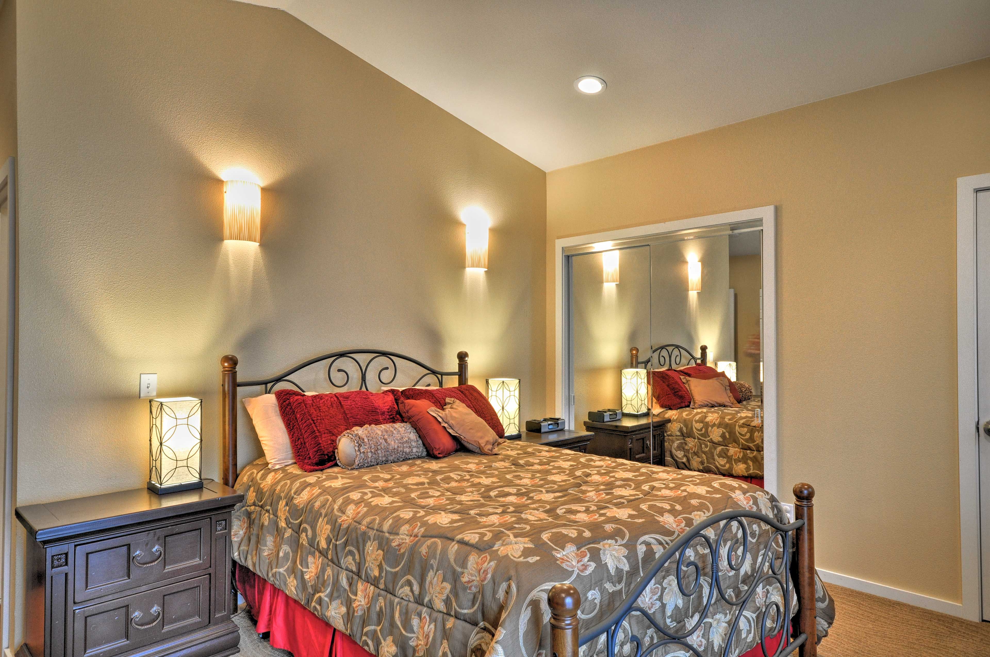 Sleep soundlessly in this bedroom with a queen-sized bed.