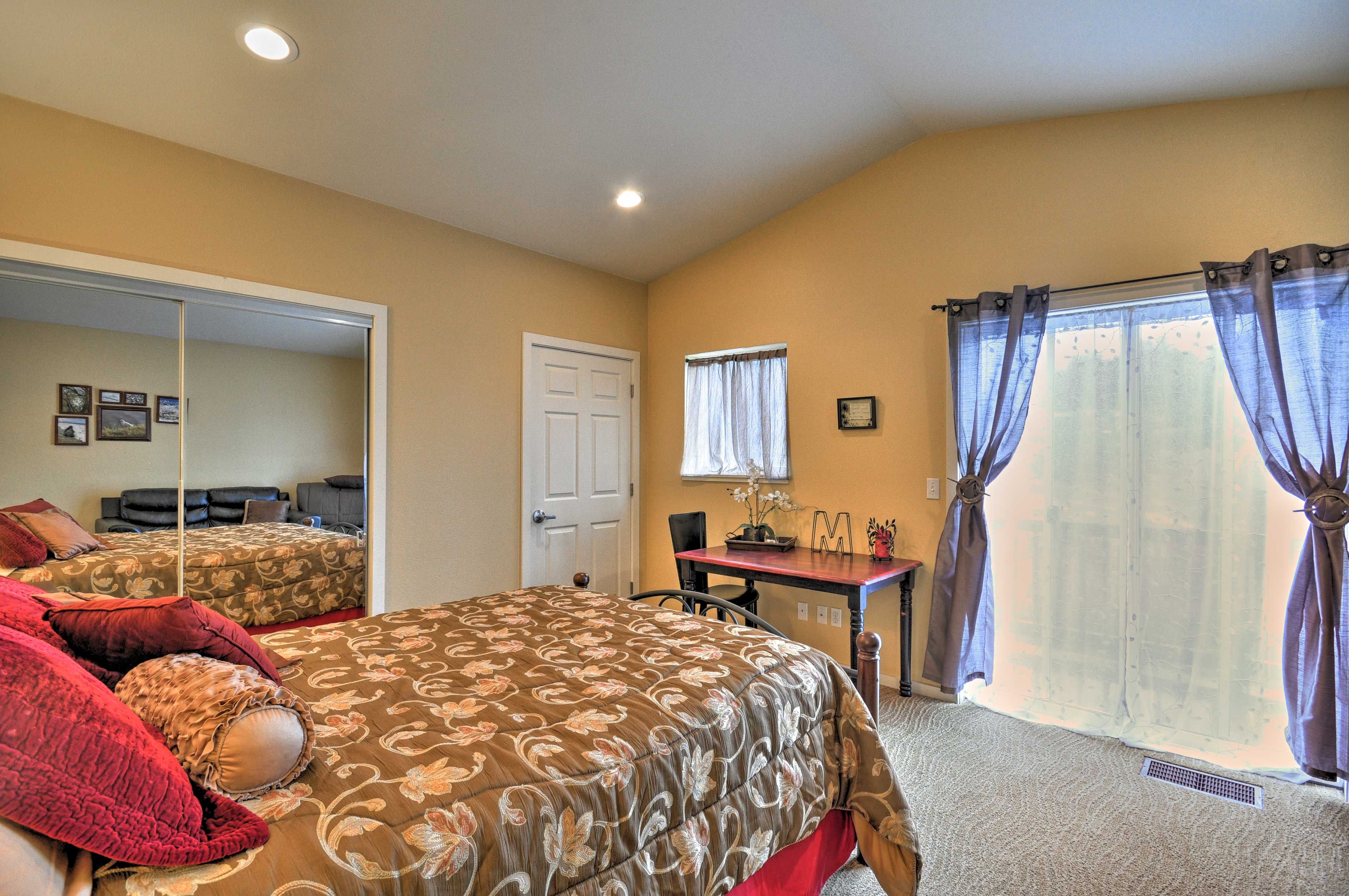 The bedroom has access to the balcony.