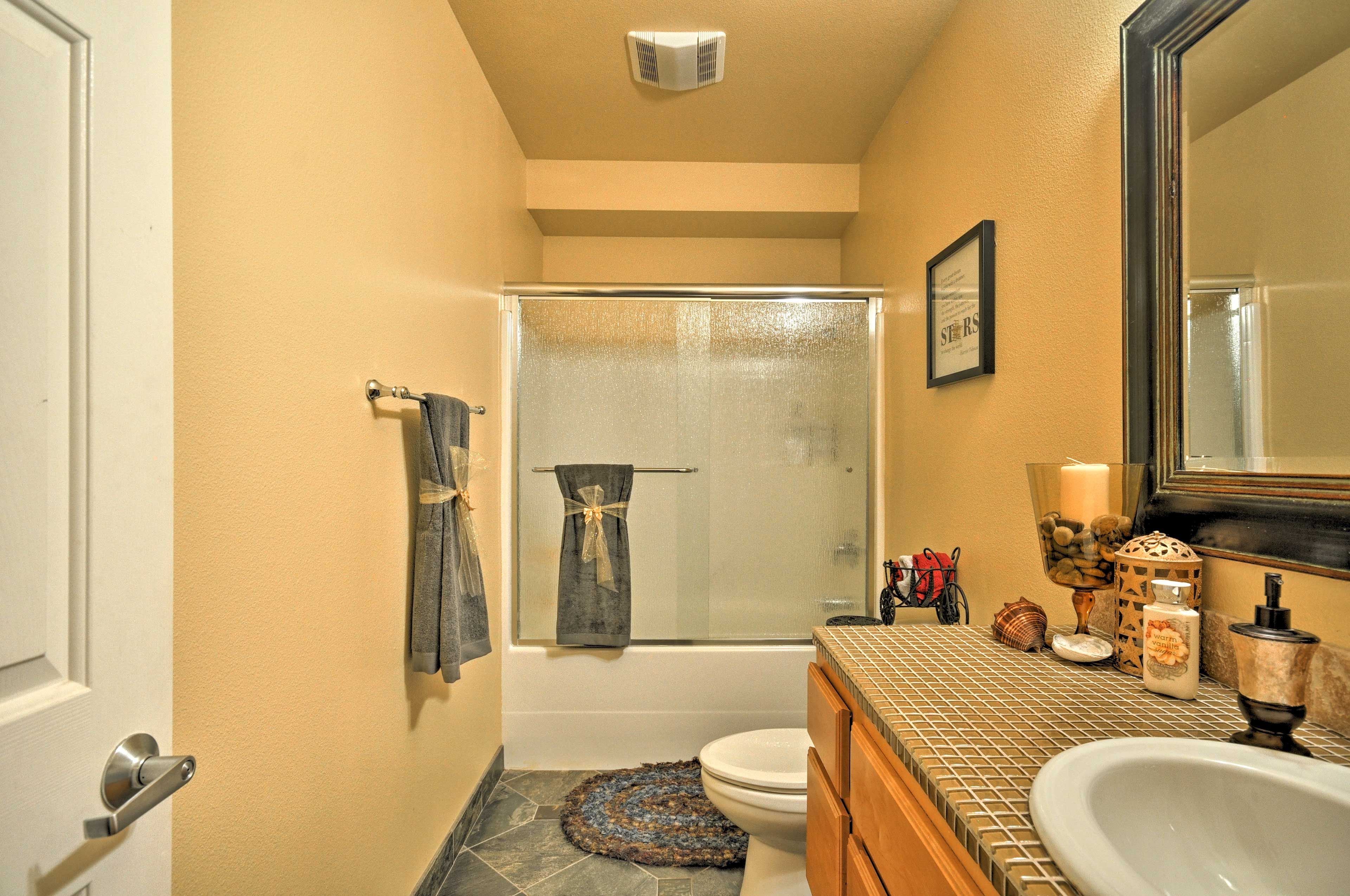 Rinse off in the second full bath's shower/tub combo.