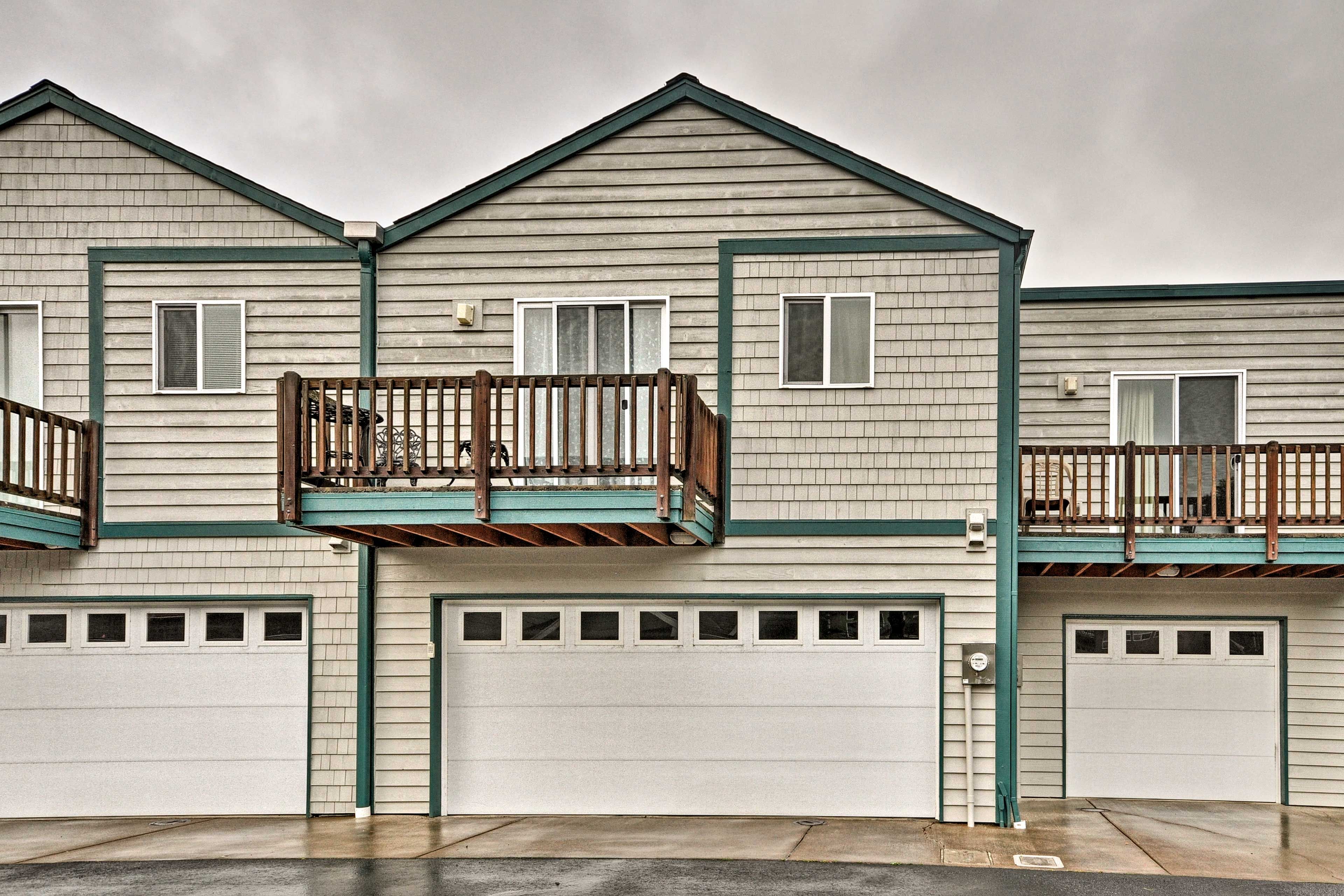 Two vehicles can be parked in the garage.