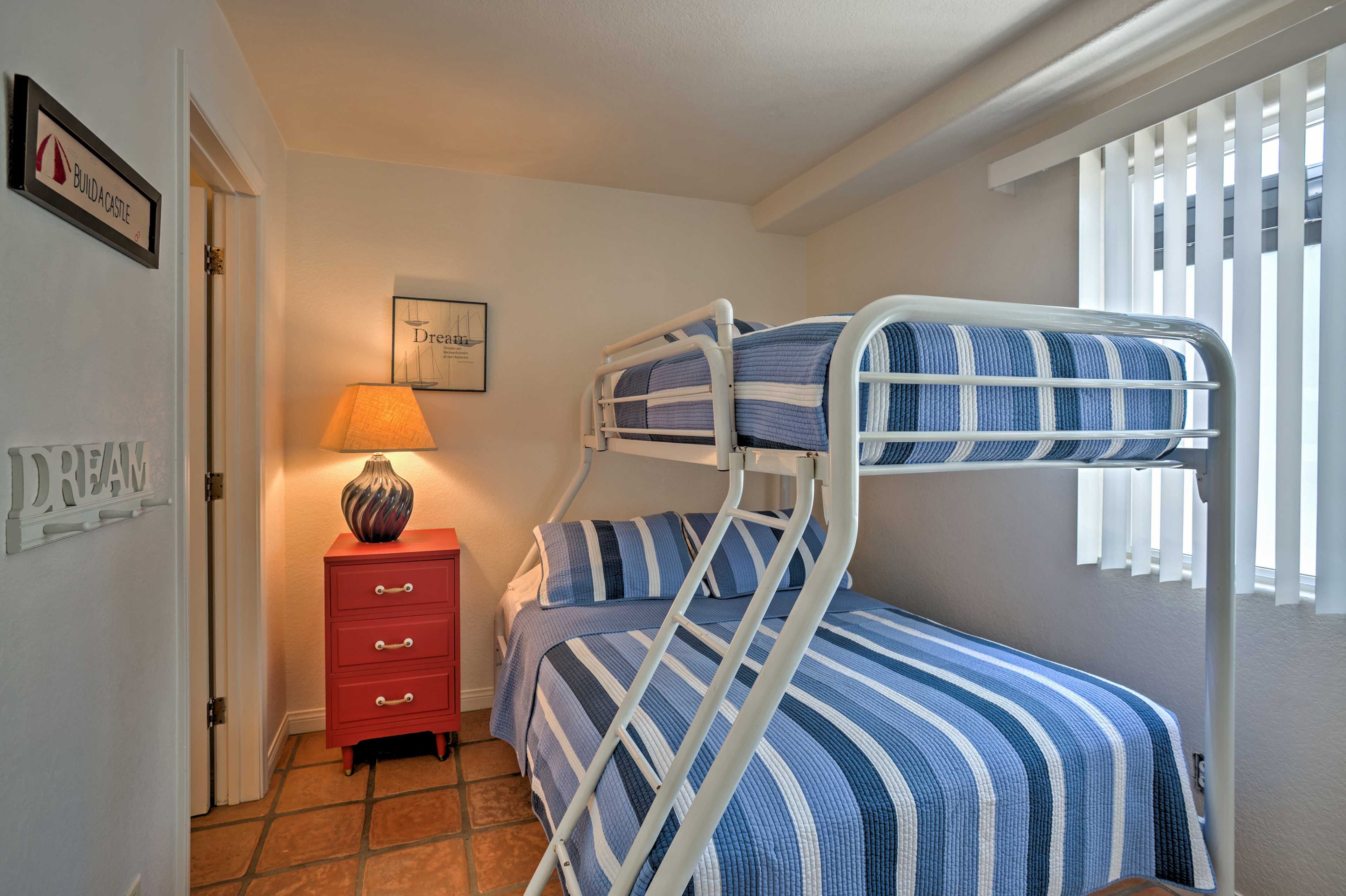 Kids will love sharing this room with twin-over-full bunk bed!