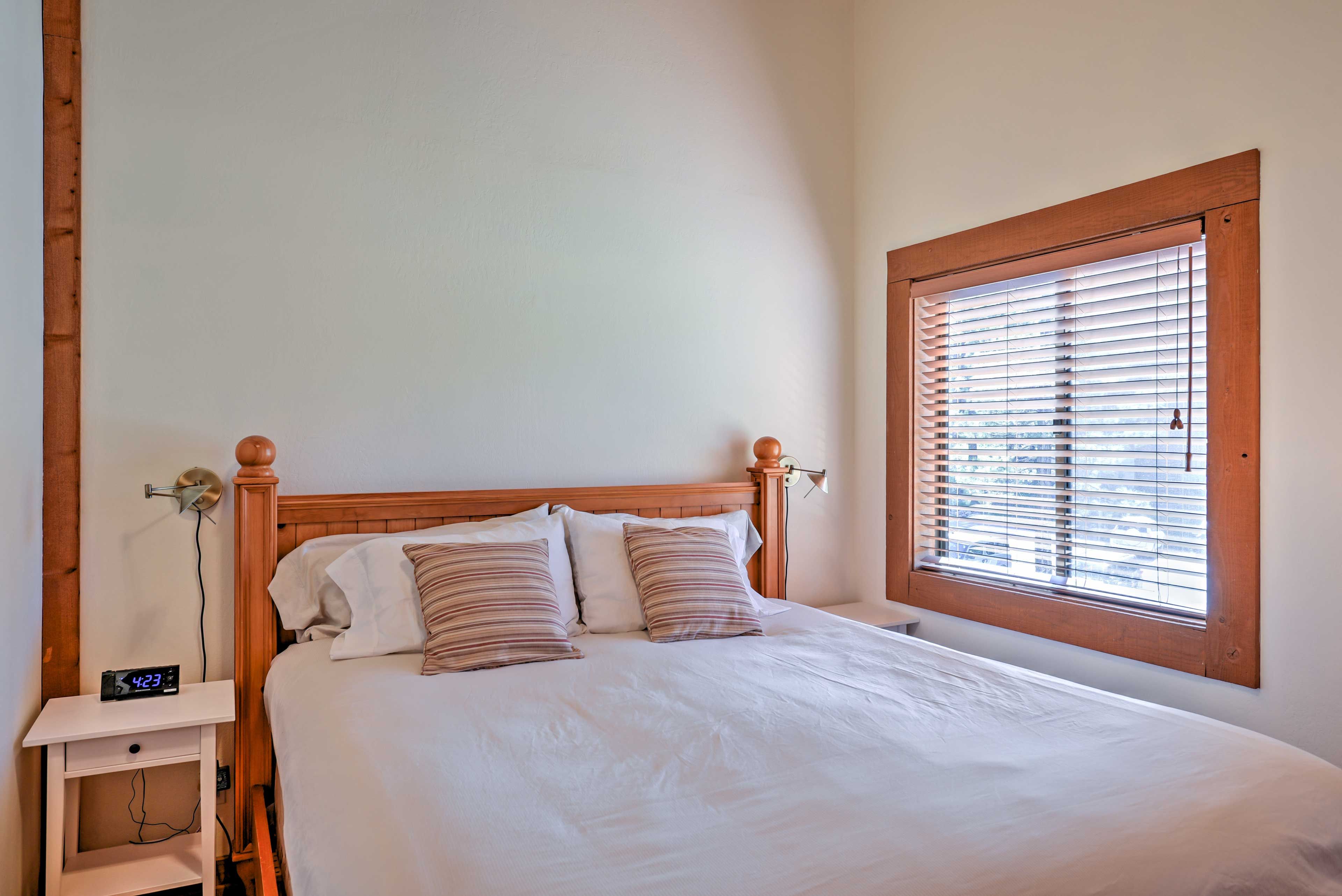 Curl up in this king-sized bed when you're ready to call it a night.