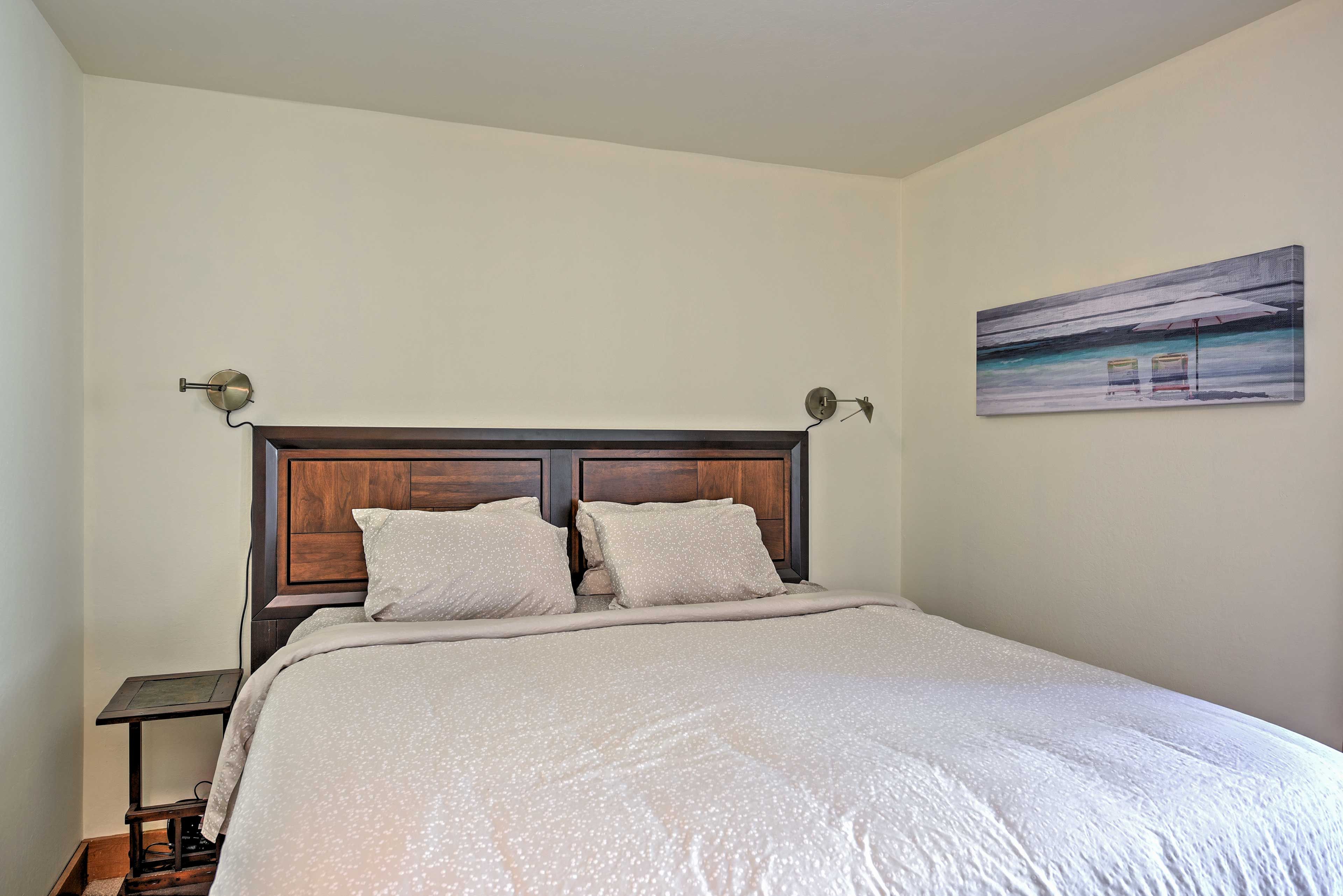 This king-sized bed ensures peaceful slumbers.