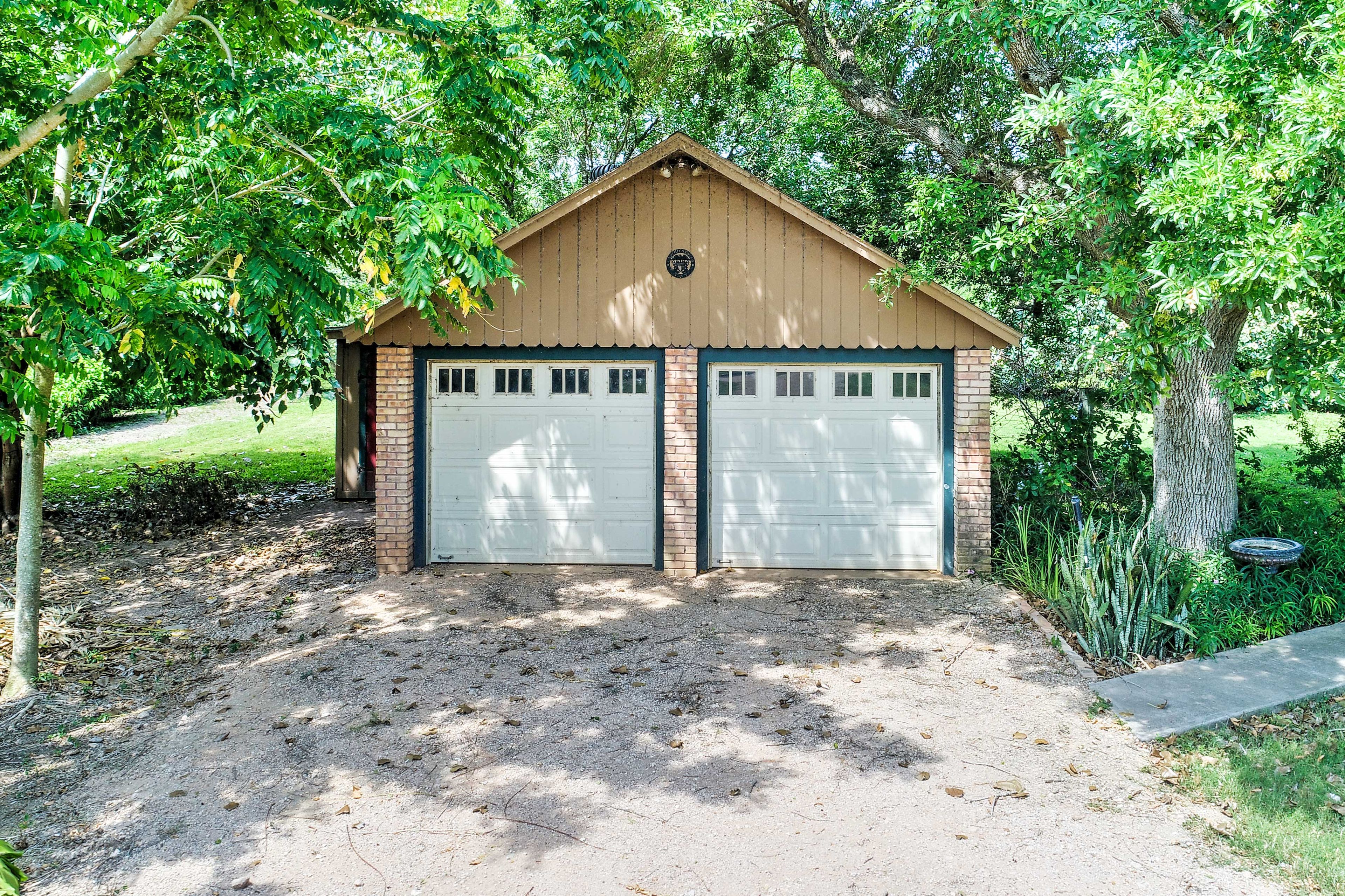 Two vehicles can be parked in the private garage.