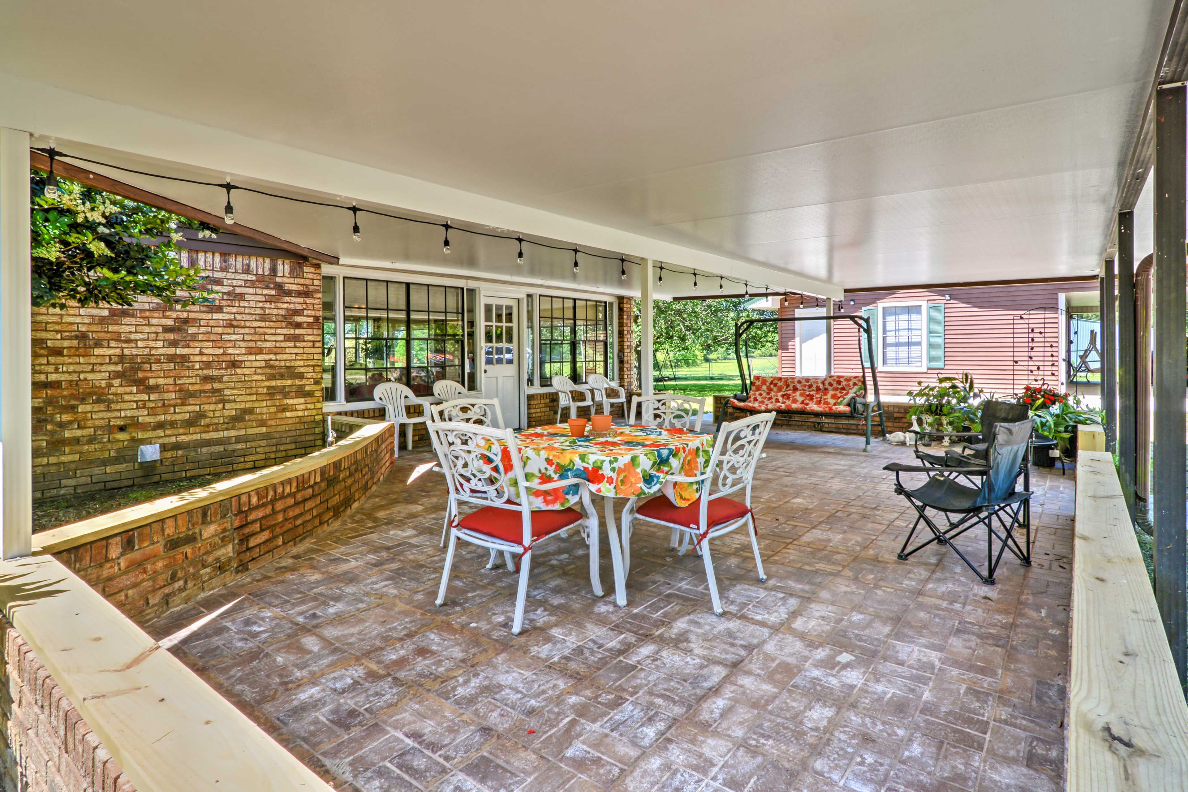 Look forward to lounging on the large covered patio with outdoor furniture.