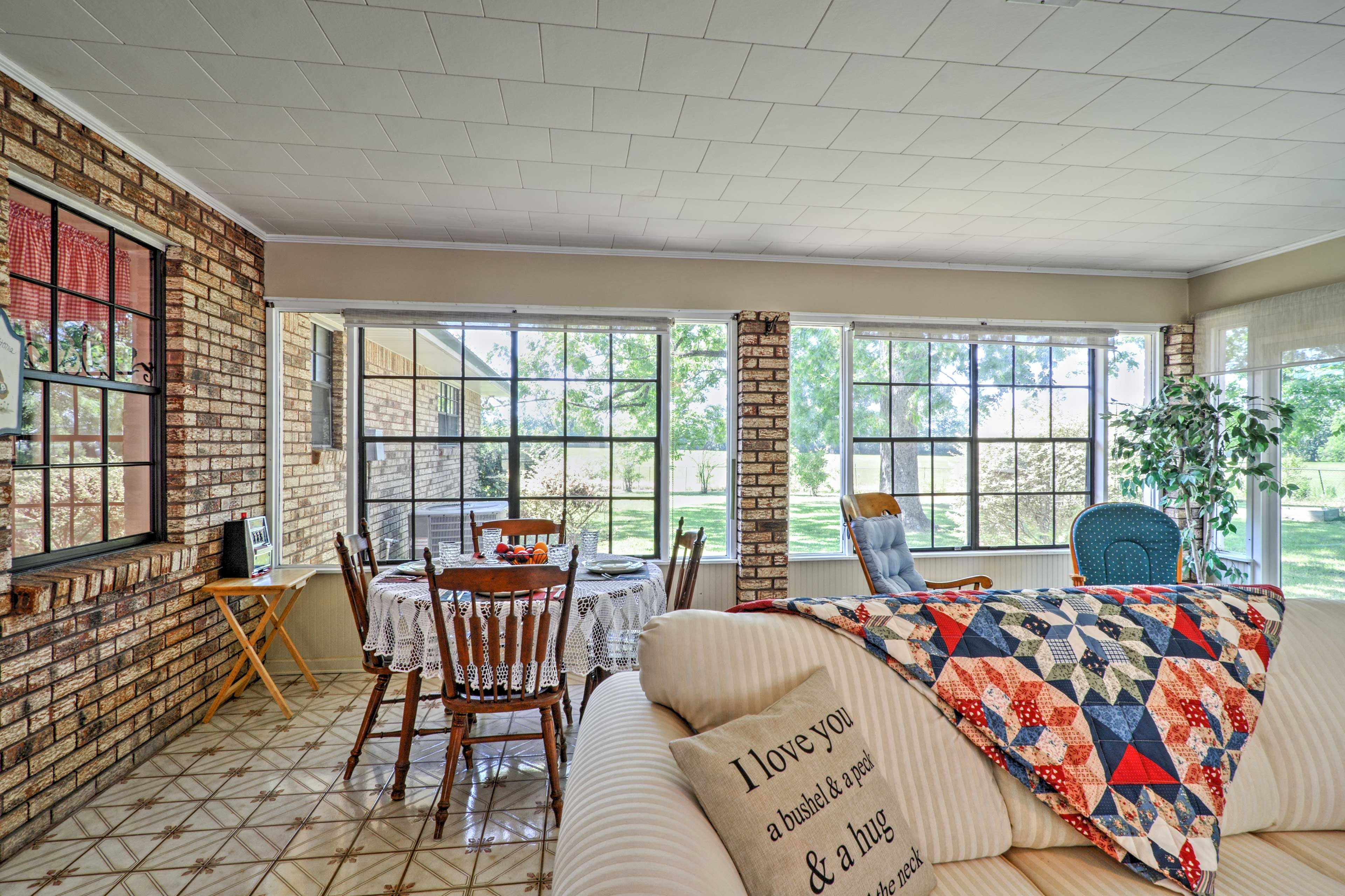 The large windows allow plenty of sunlight to illuminate the space.