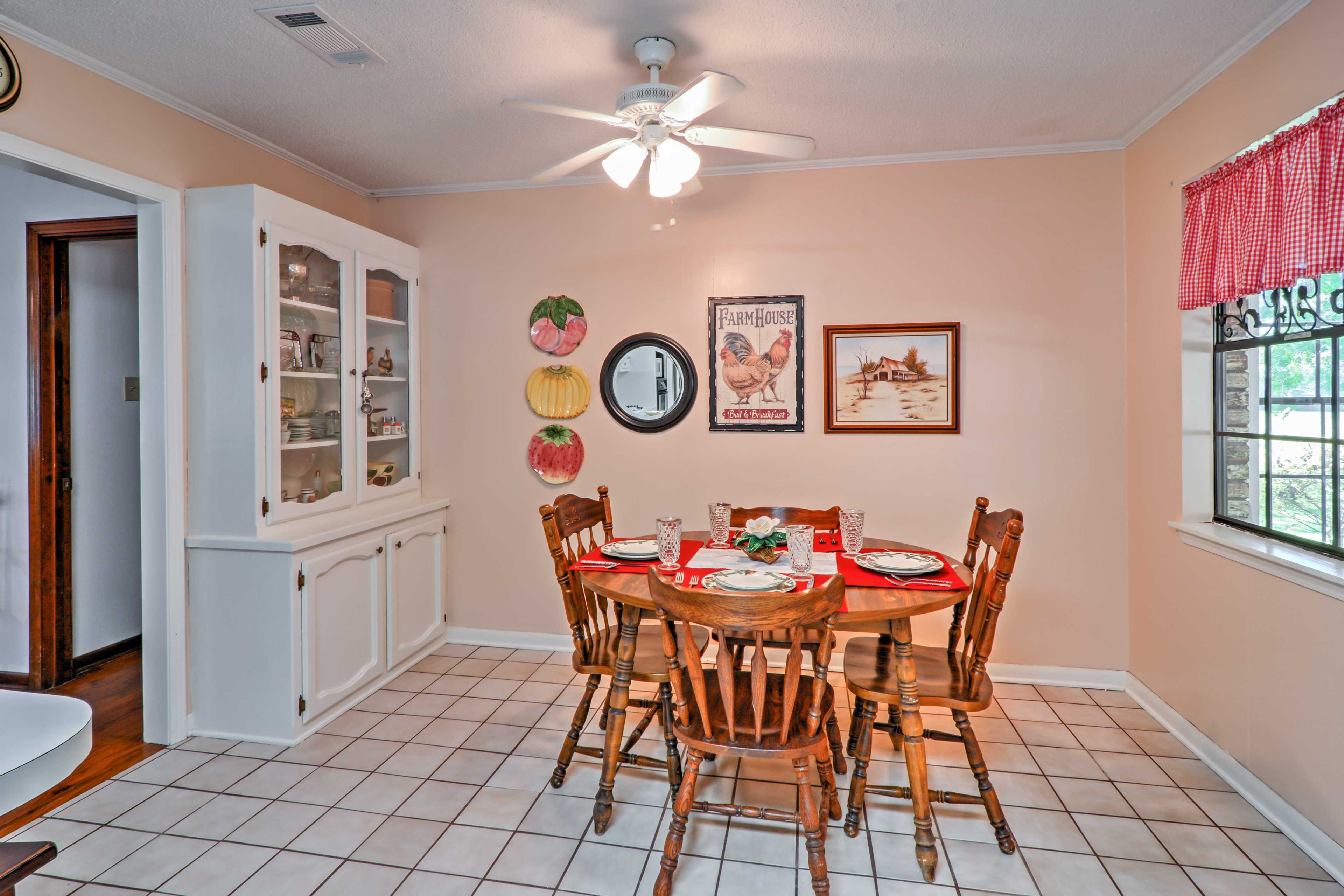 Gather around the dining table to enjoy your meals.
