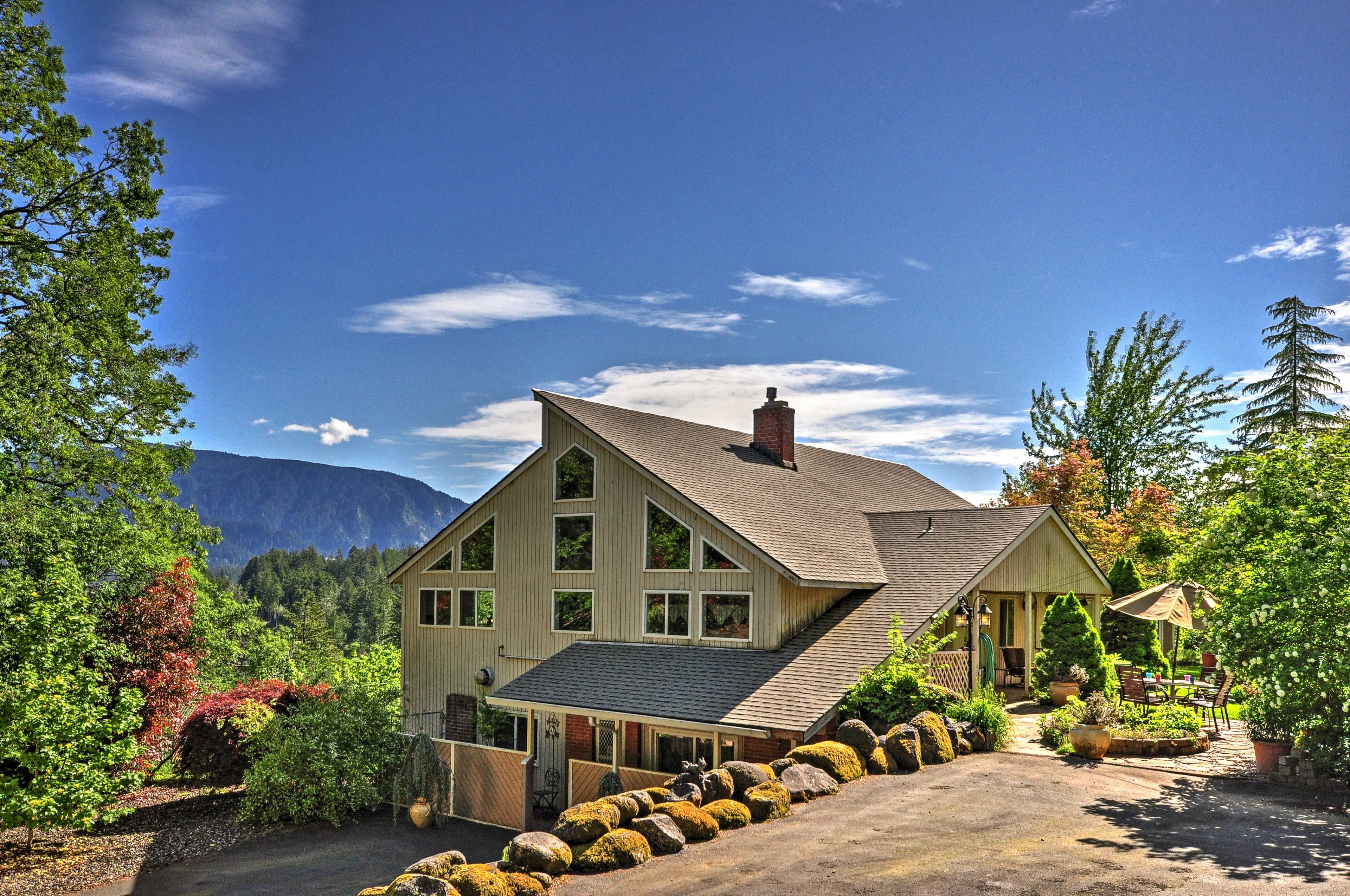The 1,855-square-foot home has 2 bedrooms & 1.5 bathrooms on 1.26 scenic acres.