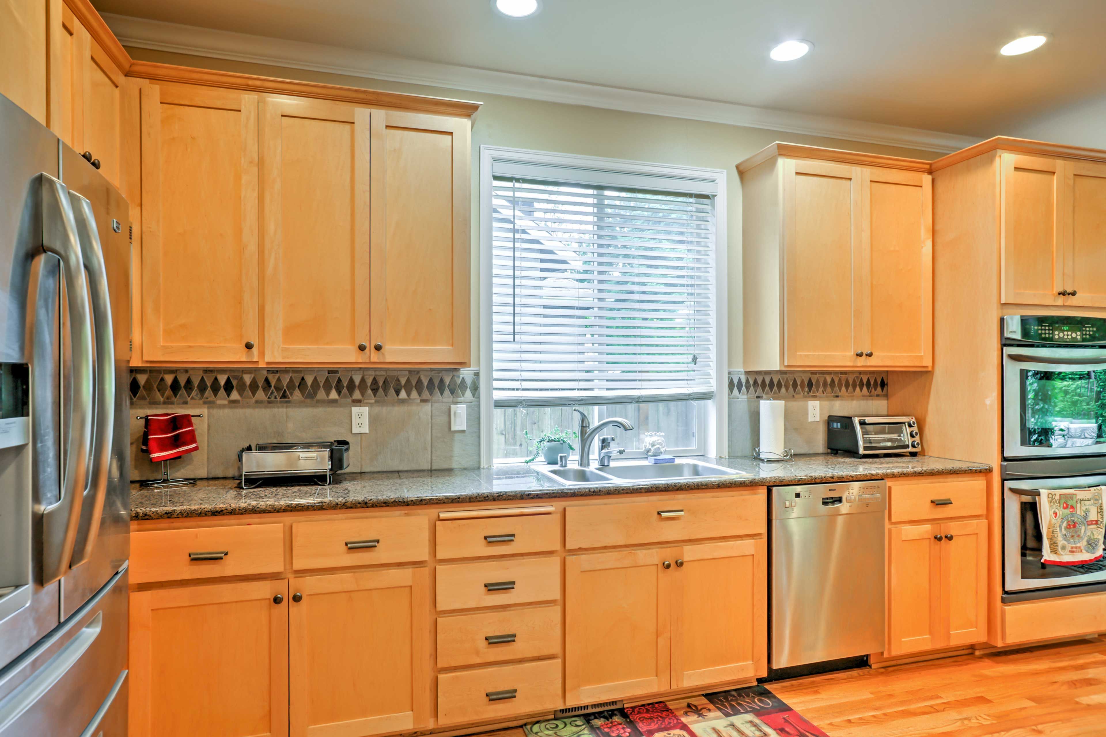 The kitchen boasts stainless steel appliances.