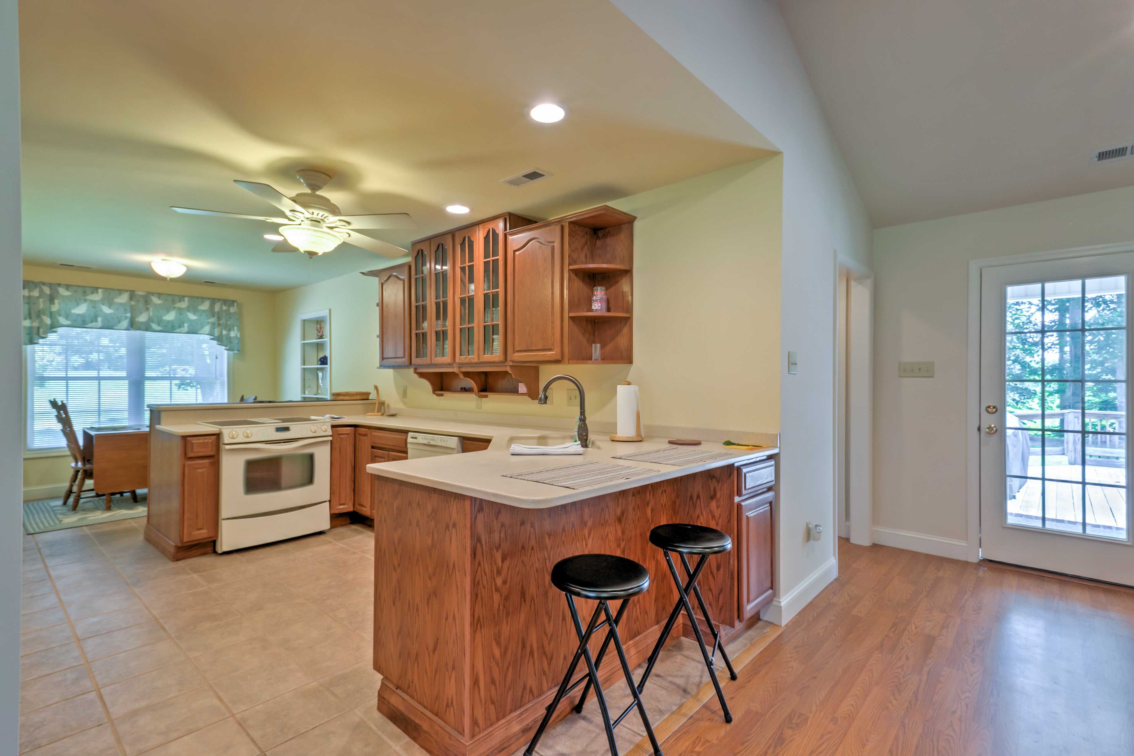 Pull up a stool at the breakfast bar to keep the chef company.