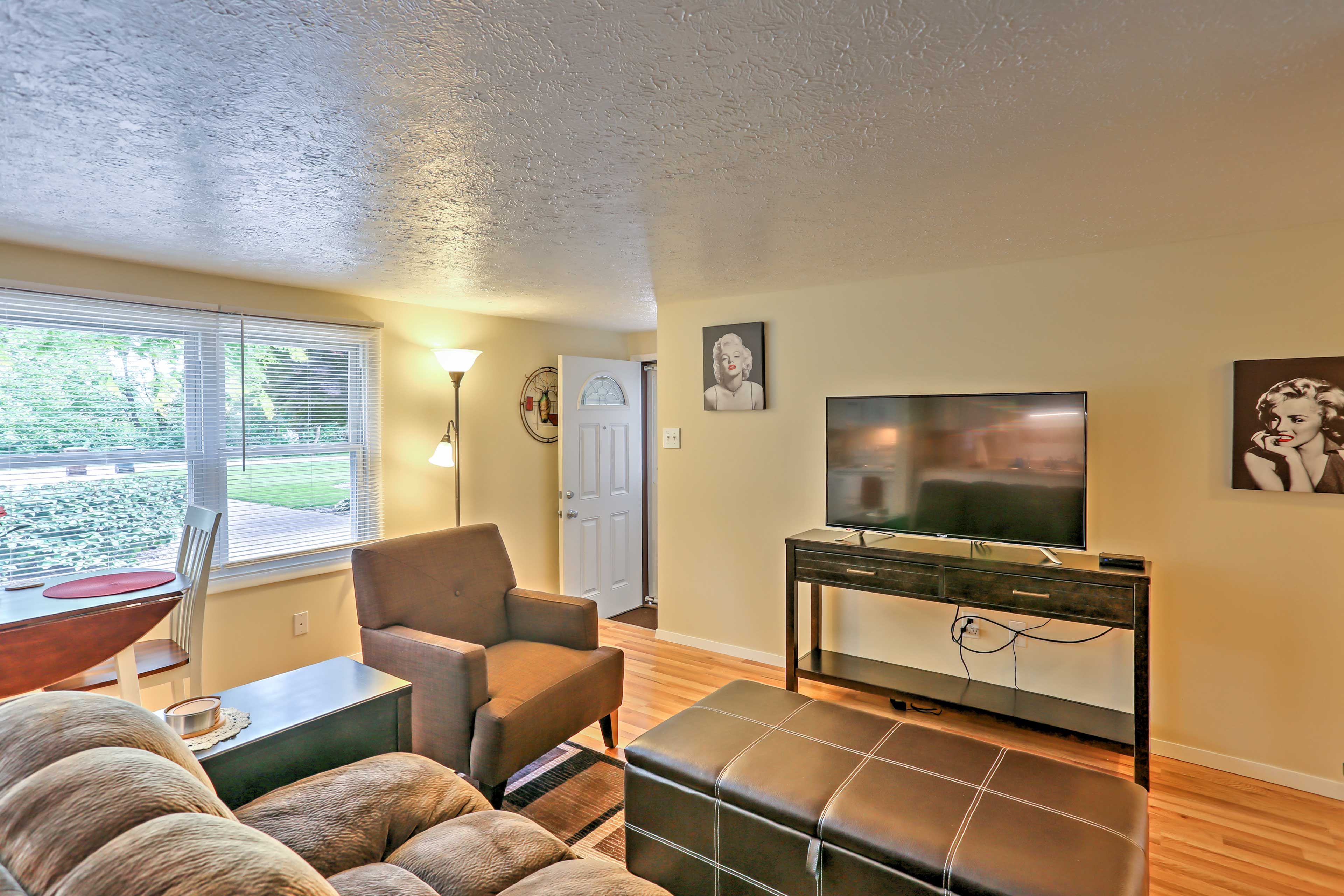 Kick your shoes off and relax on the plush furniture in the living room.