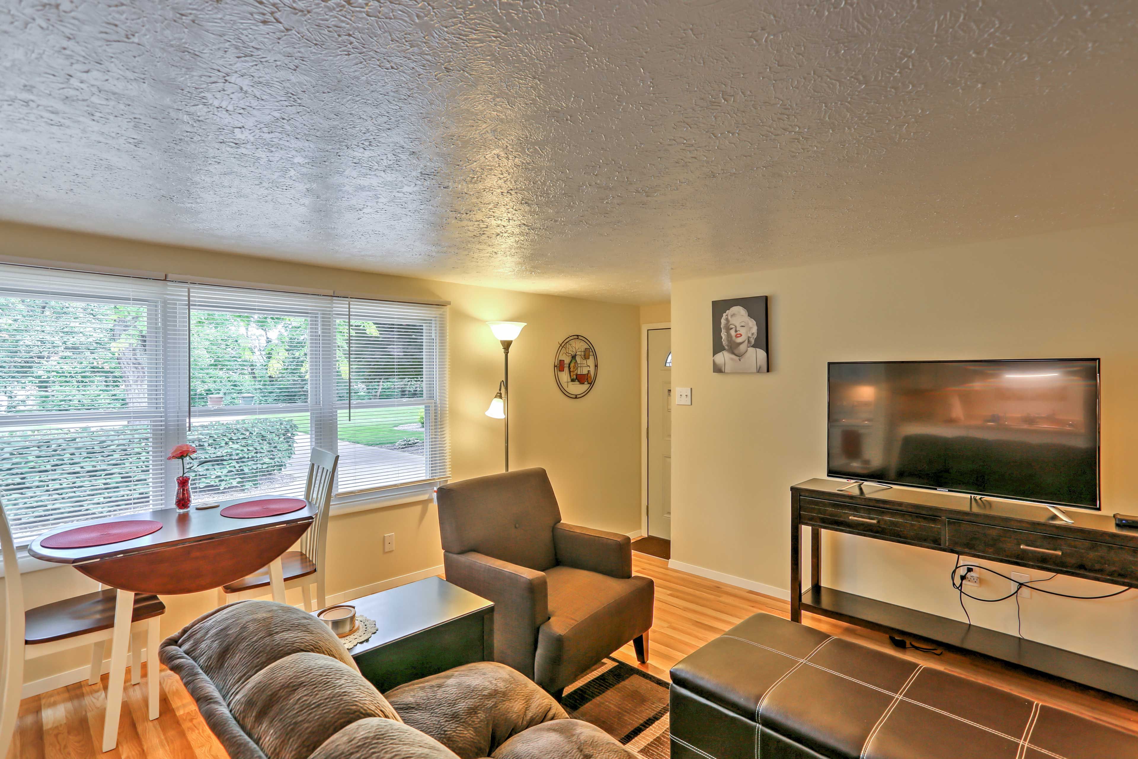 The interior is tastefully decorated and features hardwood flooring.