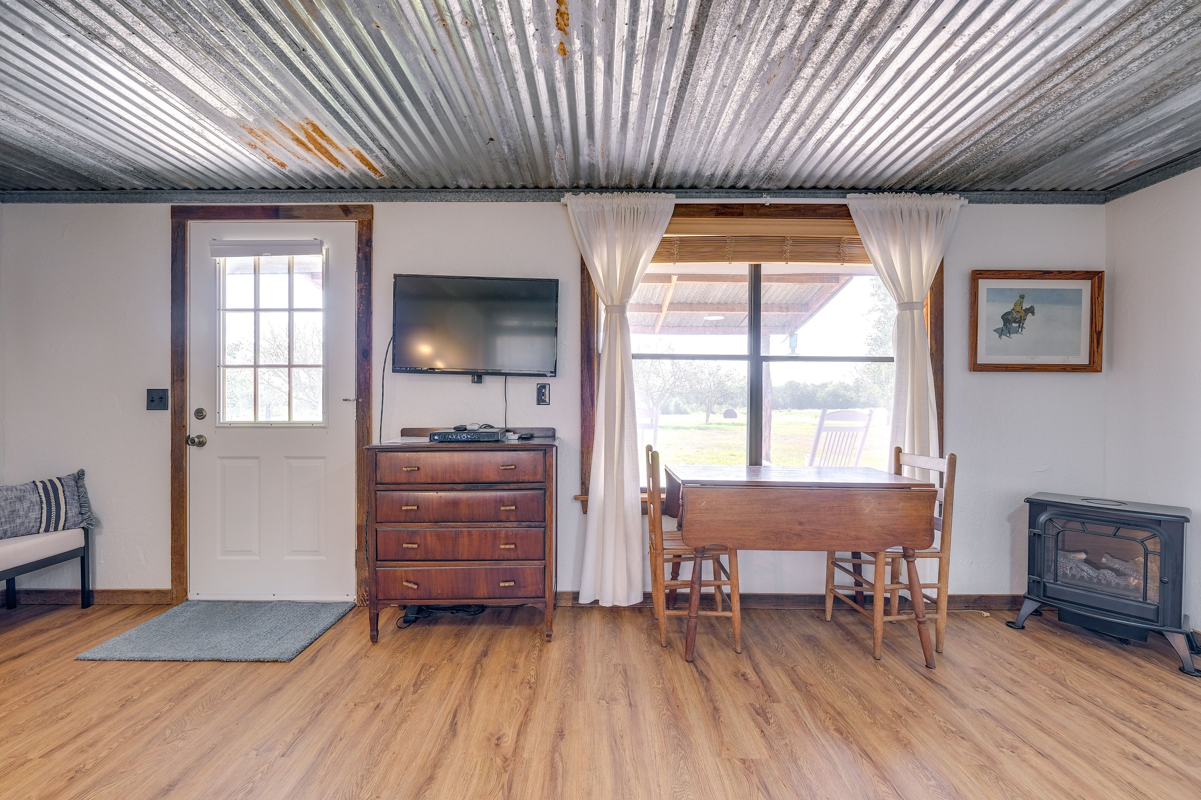 Interior | Dining Area | TV | Electric Fireplace
