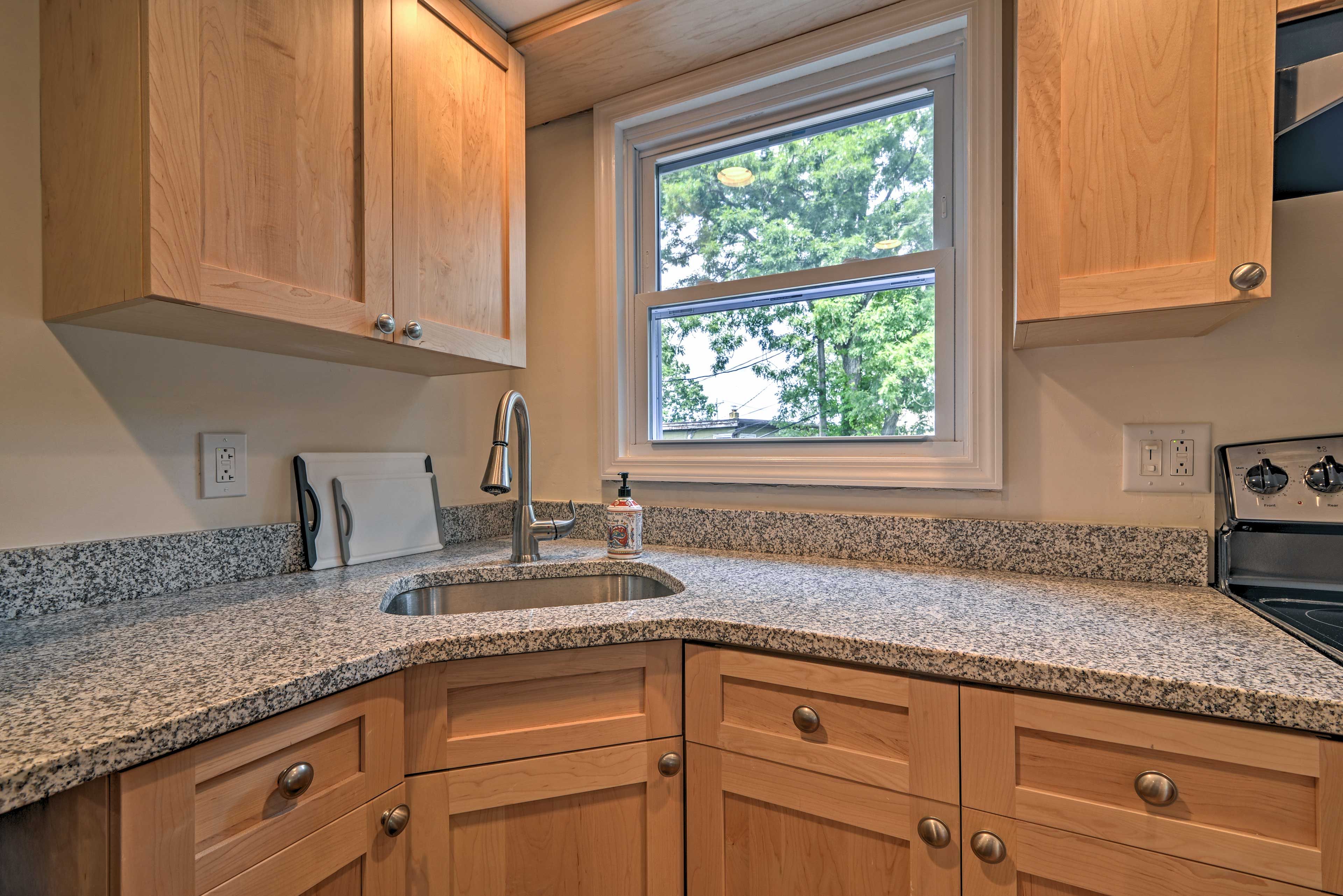 Ample counter space makes meal prep in this kitchen easy as pie.