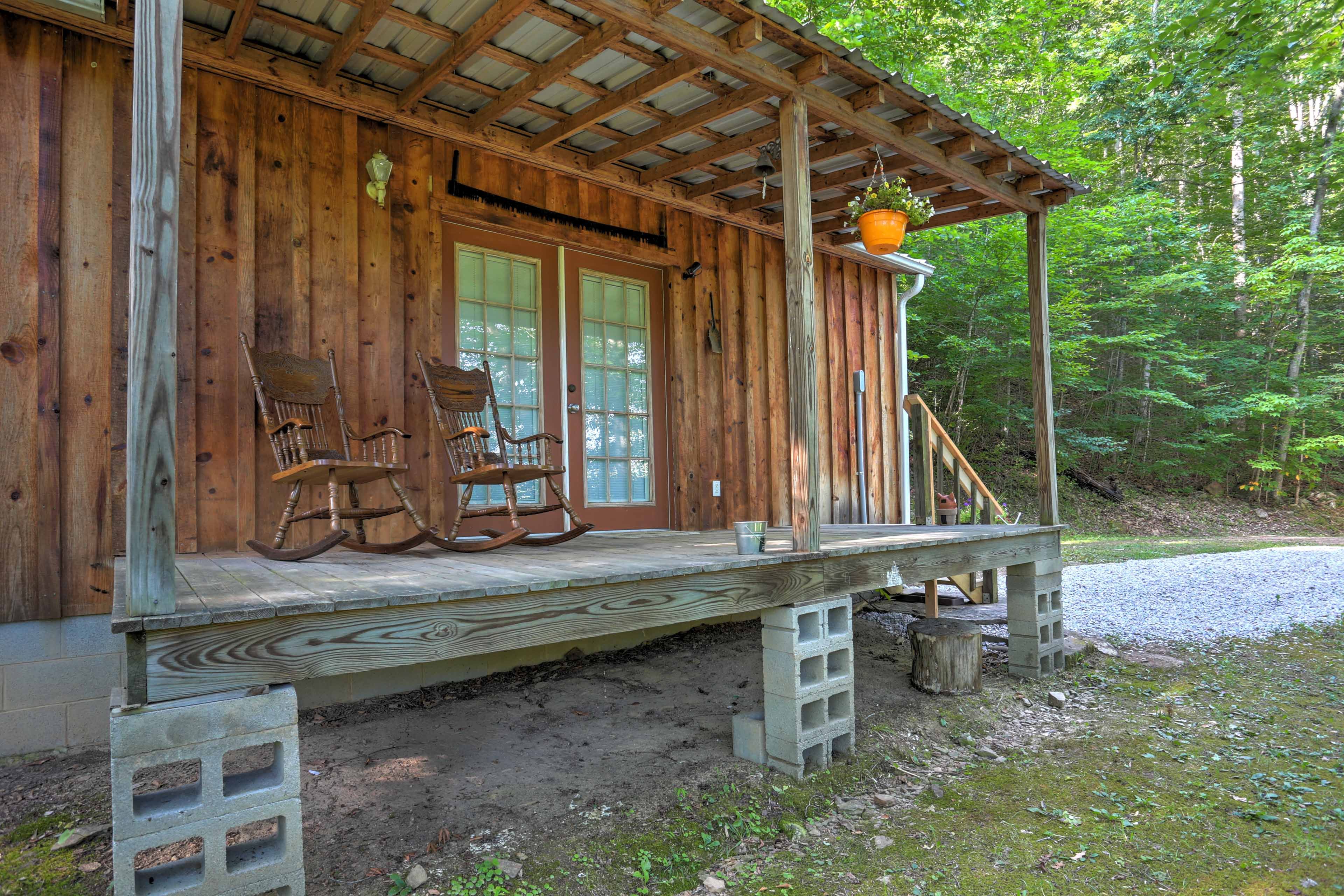The rustic cabin is secluded in the beautiful forest.