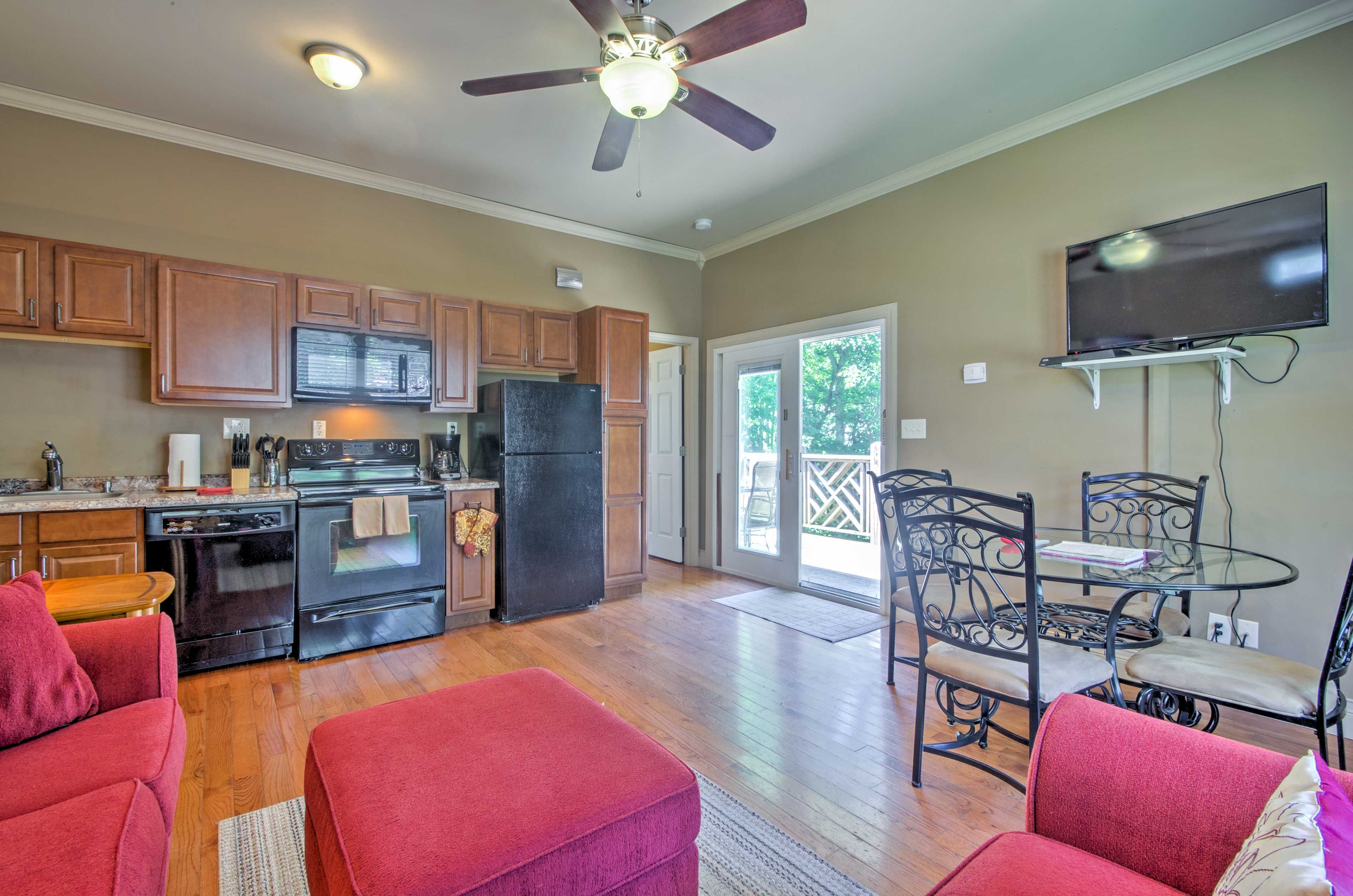 Hardwood floors and stylish furniture fill the main space of the home.