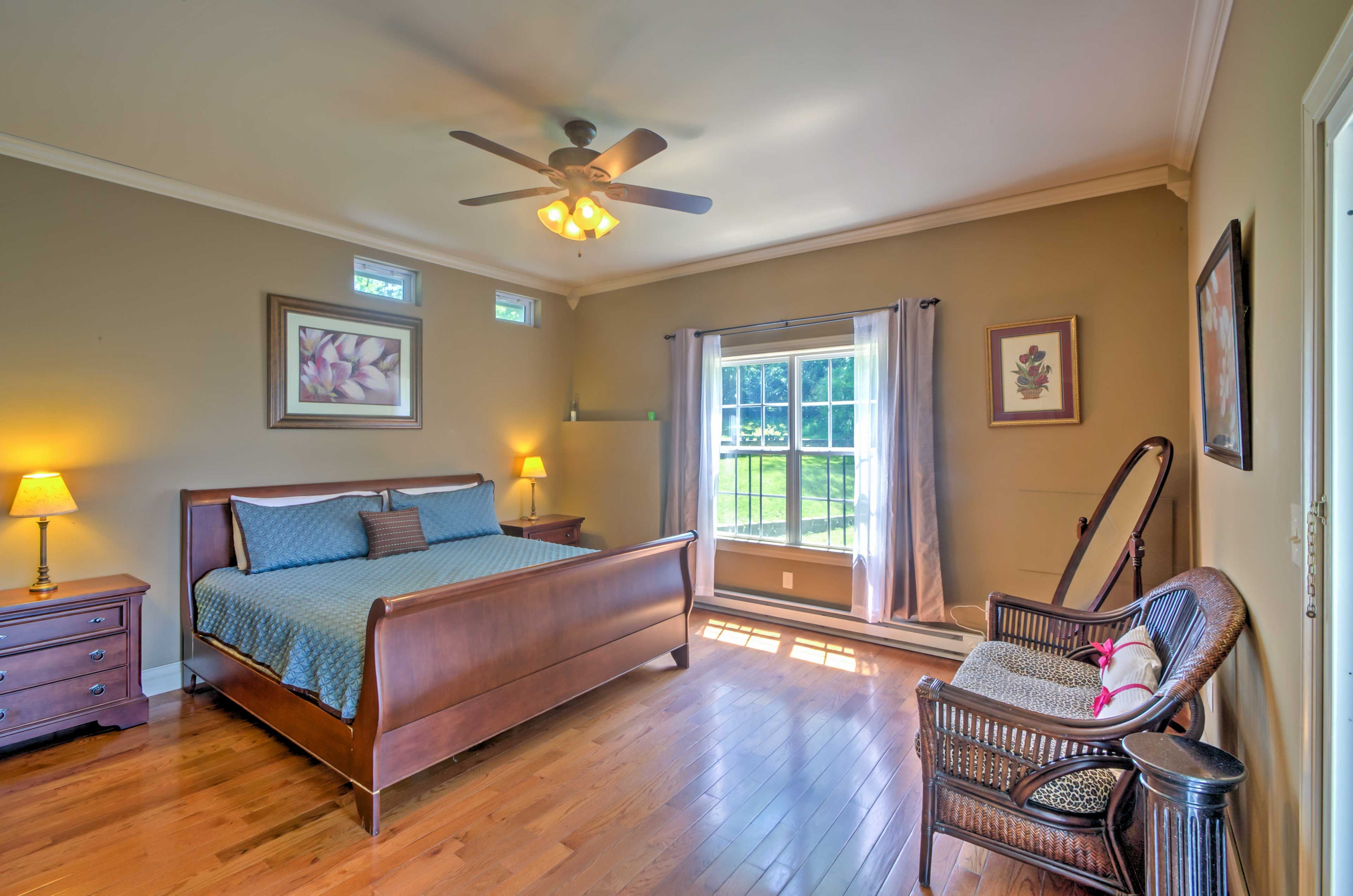 The bedroom provides restful nights of sleep with a plush king bed.