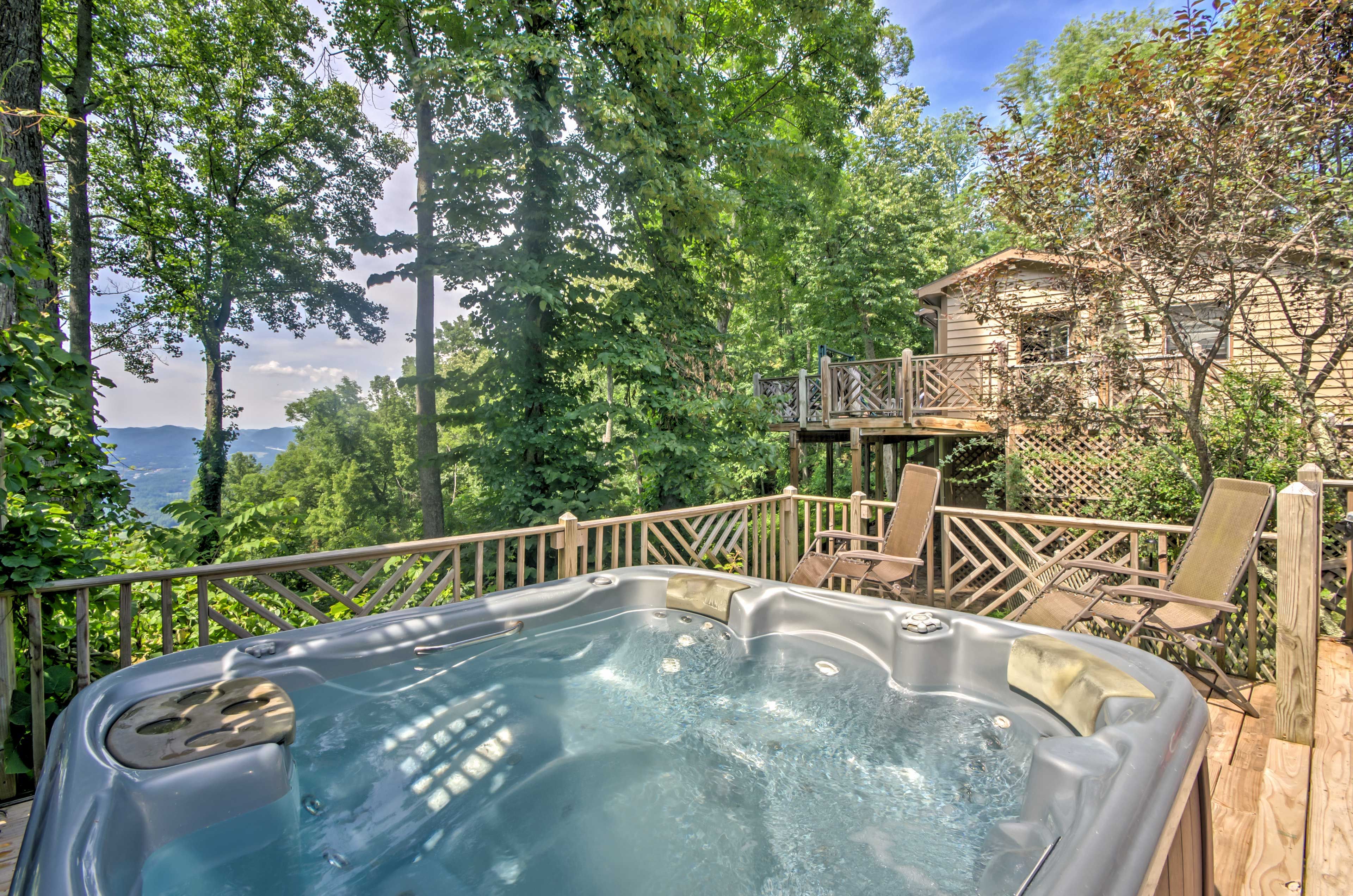 Enjoy a relaxing soak in the private hot tub.