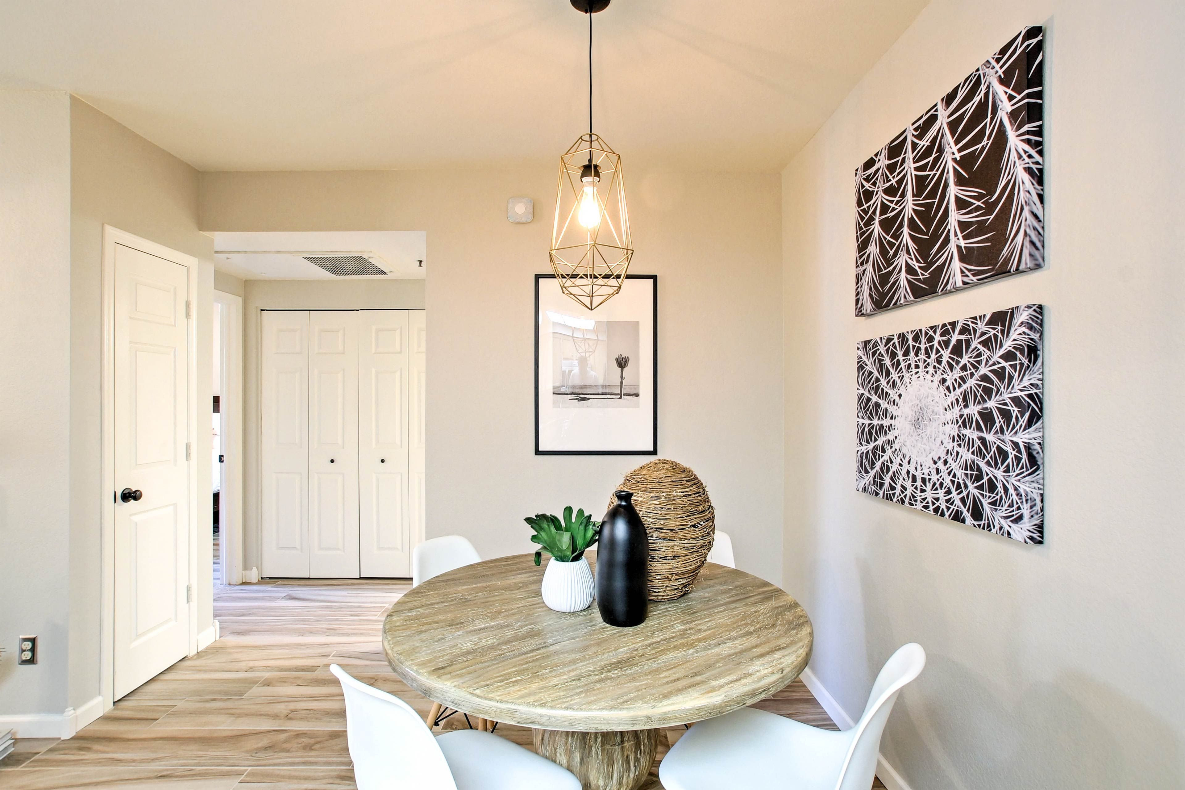 The condo features a private balcony that looks out onto the community.