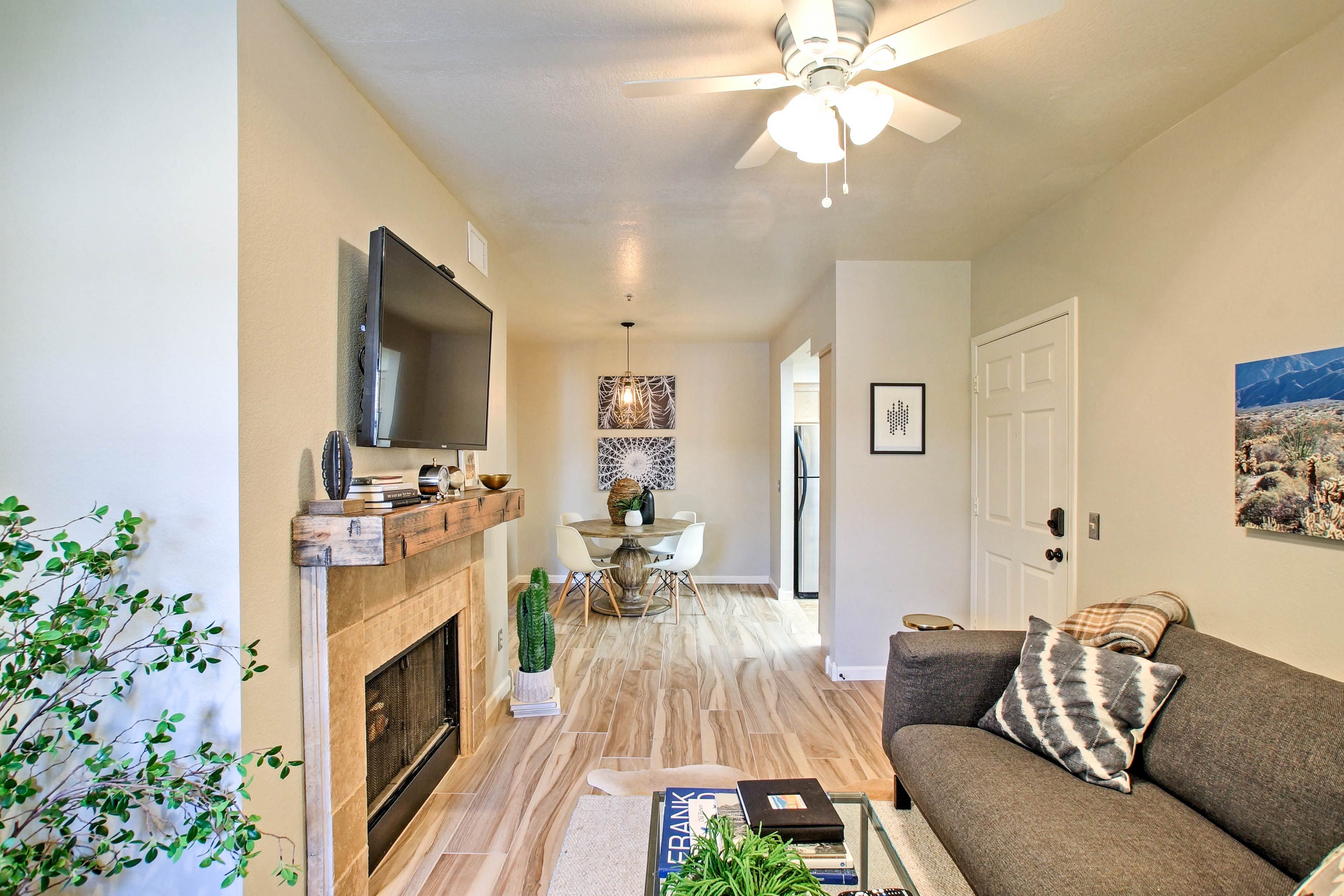 Kick back to watch your favorite shows on the flat-screen cable TV.