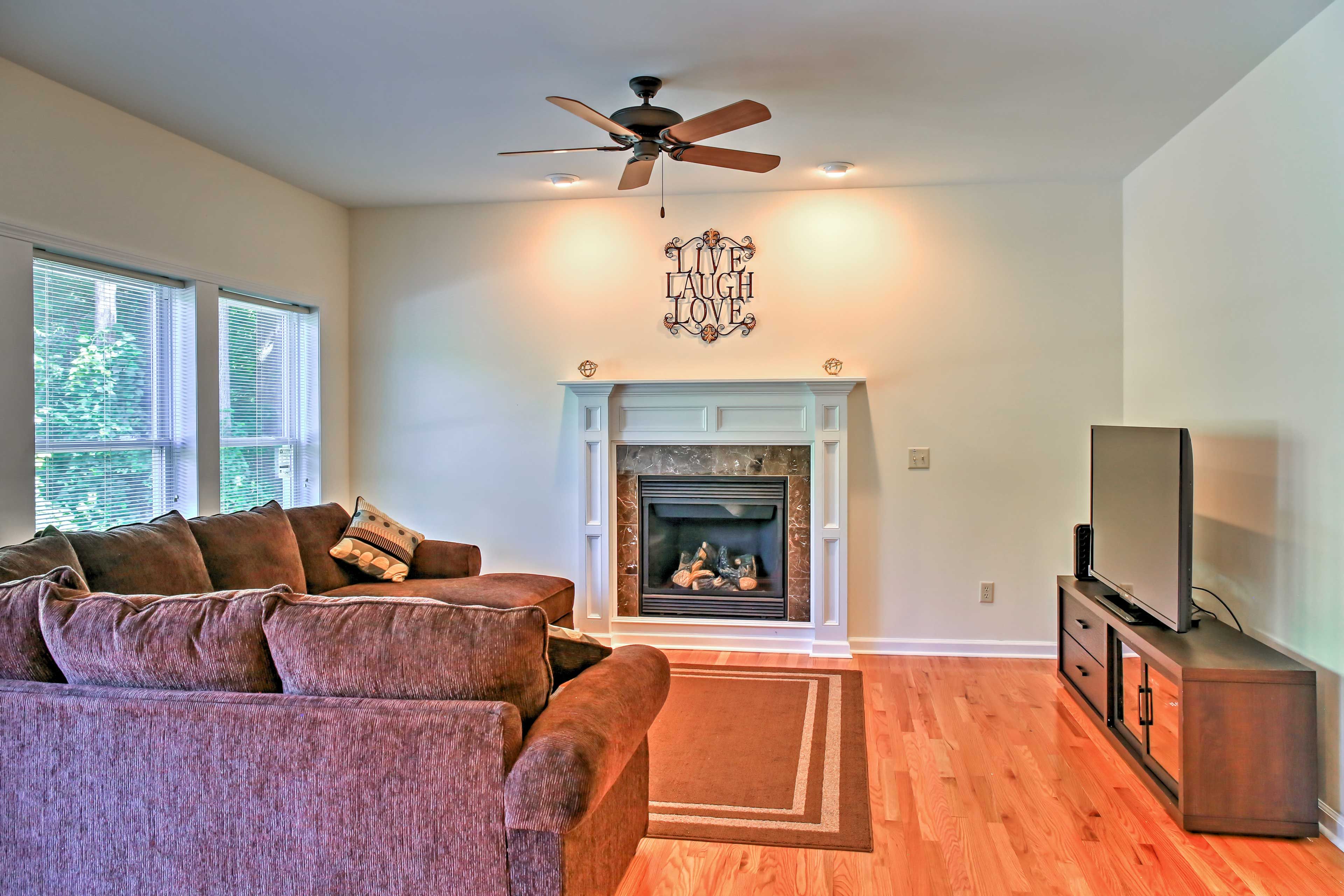 Cozy up in the den area with a fireplace and 55-inch flat-screen TV.