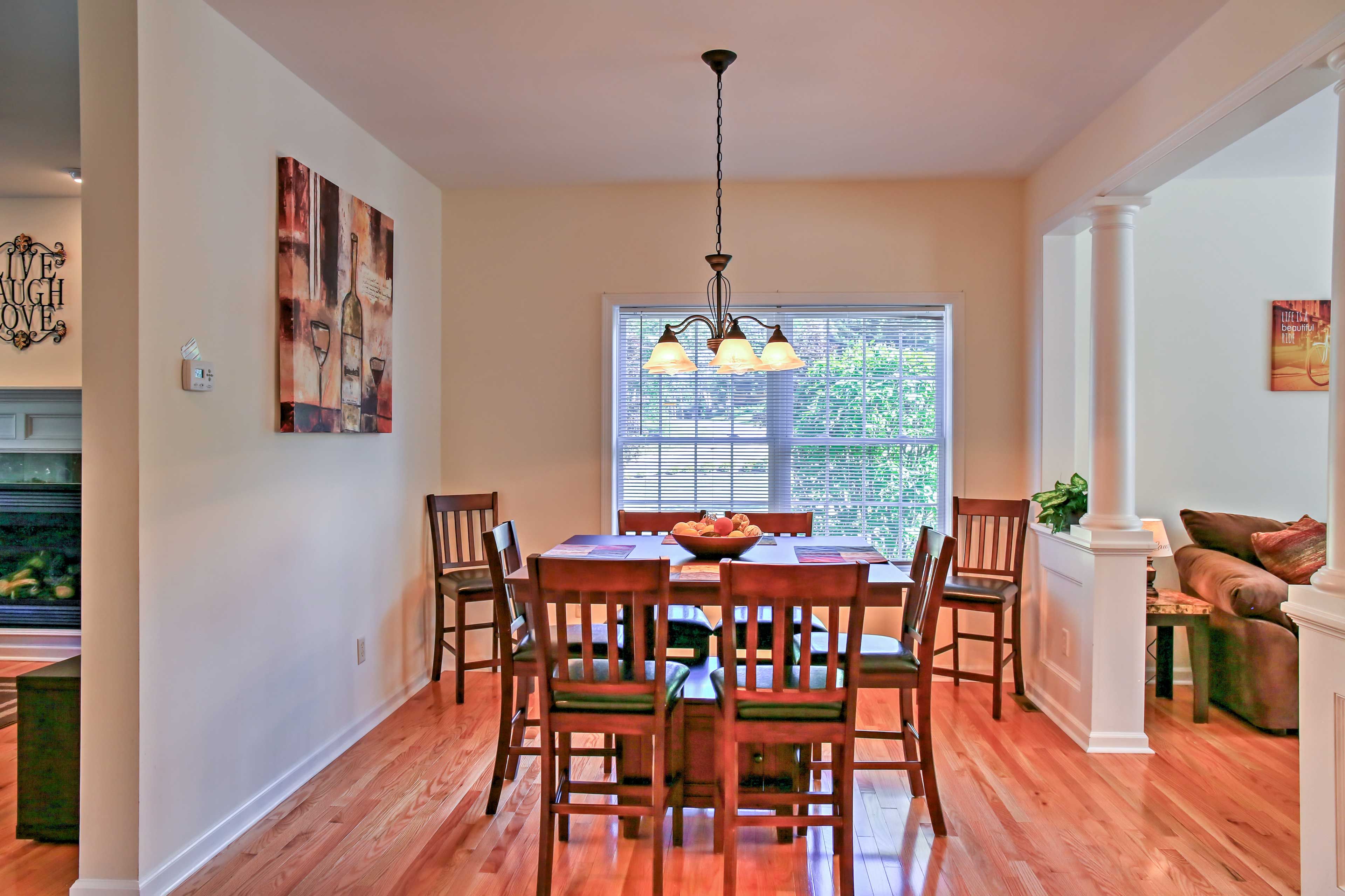Share home-cooked meals at the elegant dining table with room for 8.
