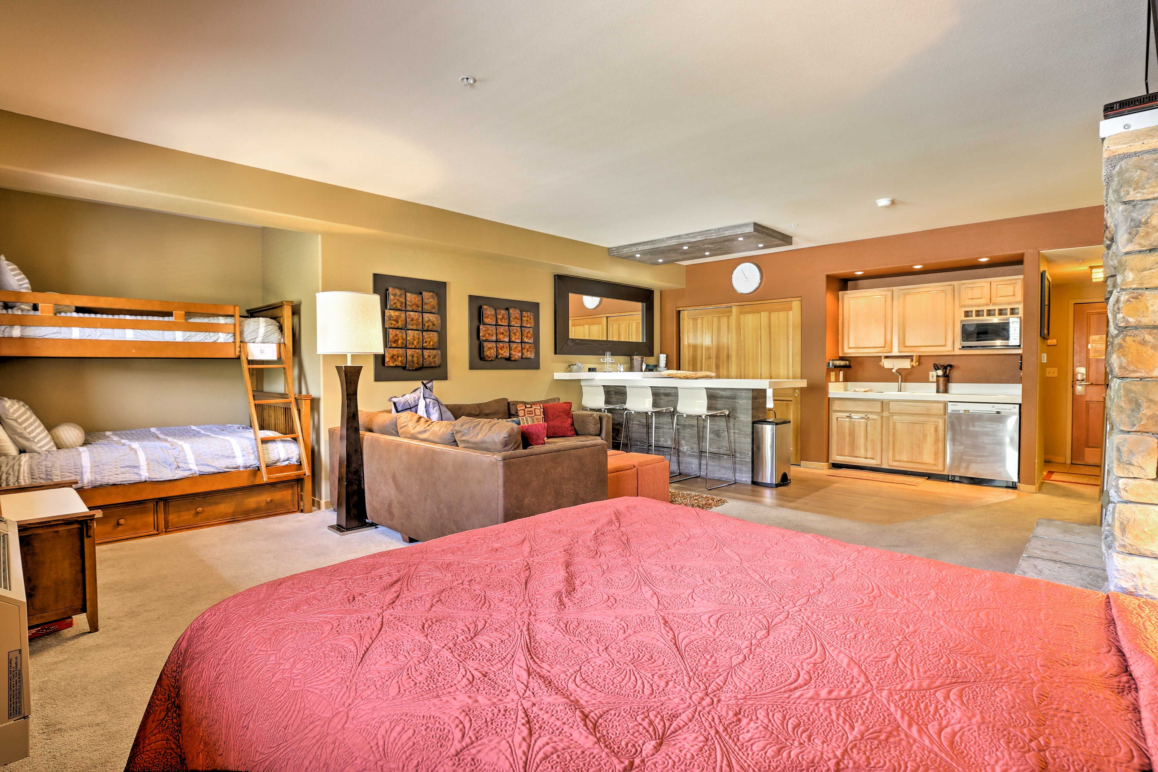 The studio features a comfortable queen-sized bed.