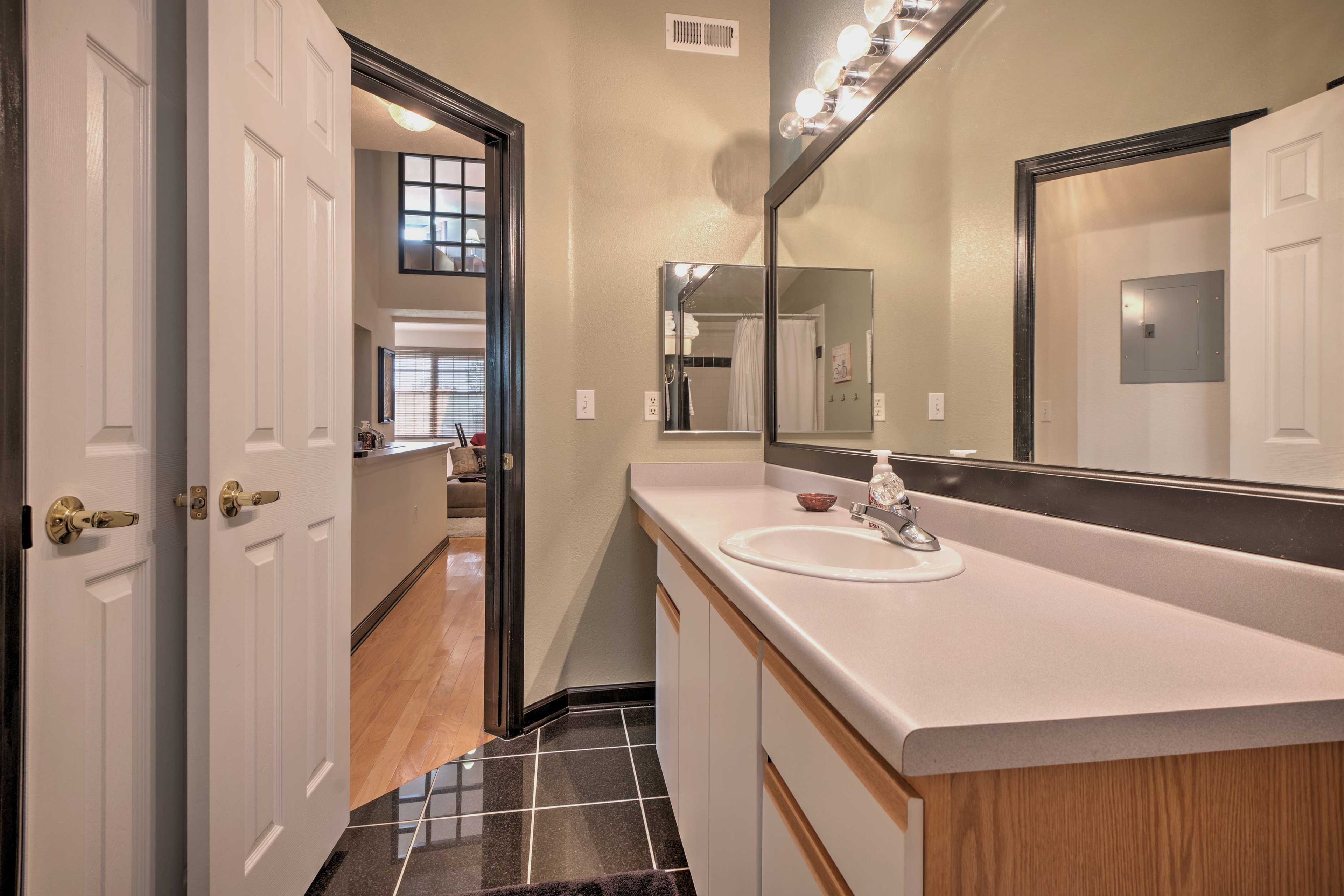 Wash up for bed in this full bathroom.