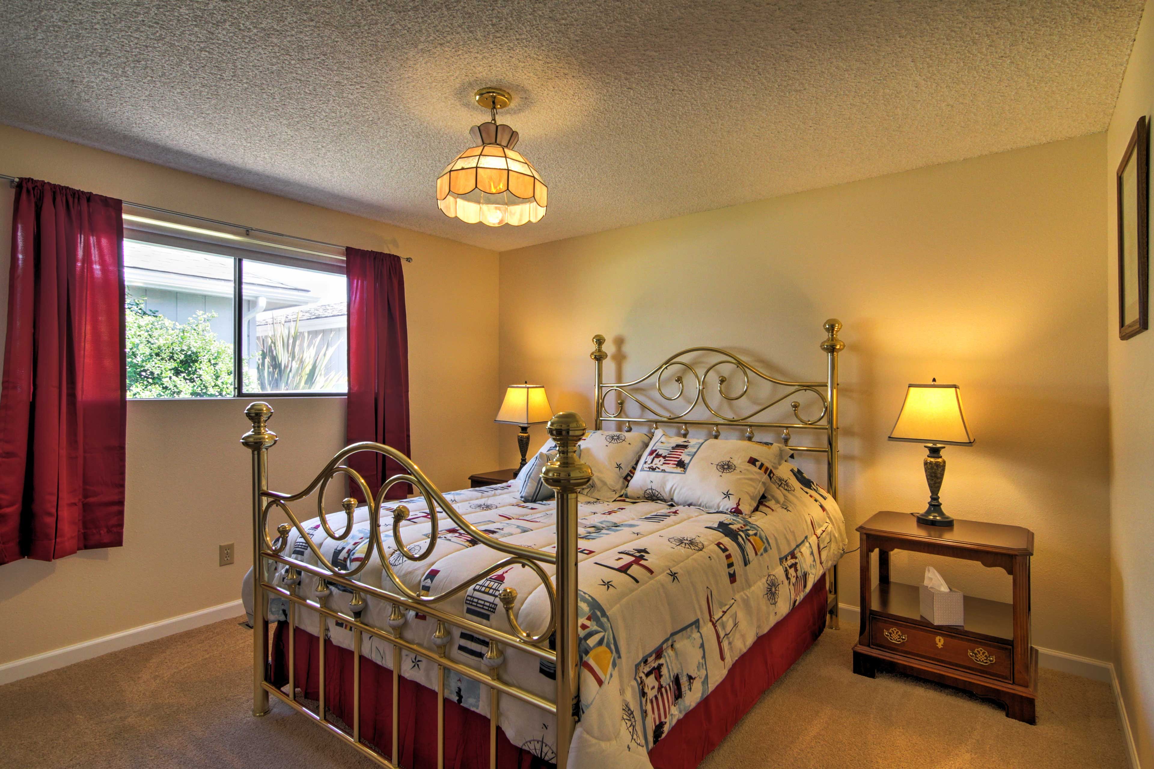 Sink into this comfortable queen-sized bed for a restful night's sleep.