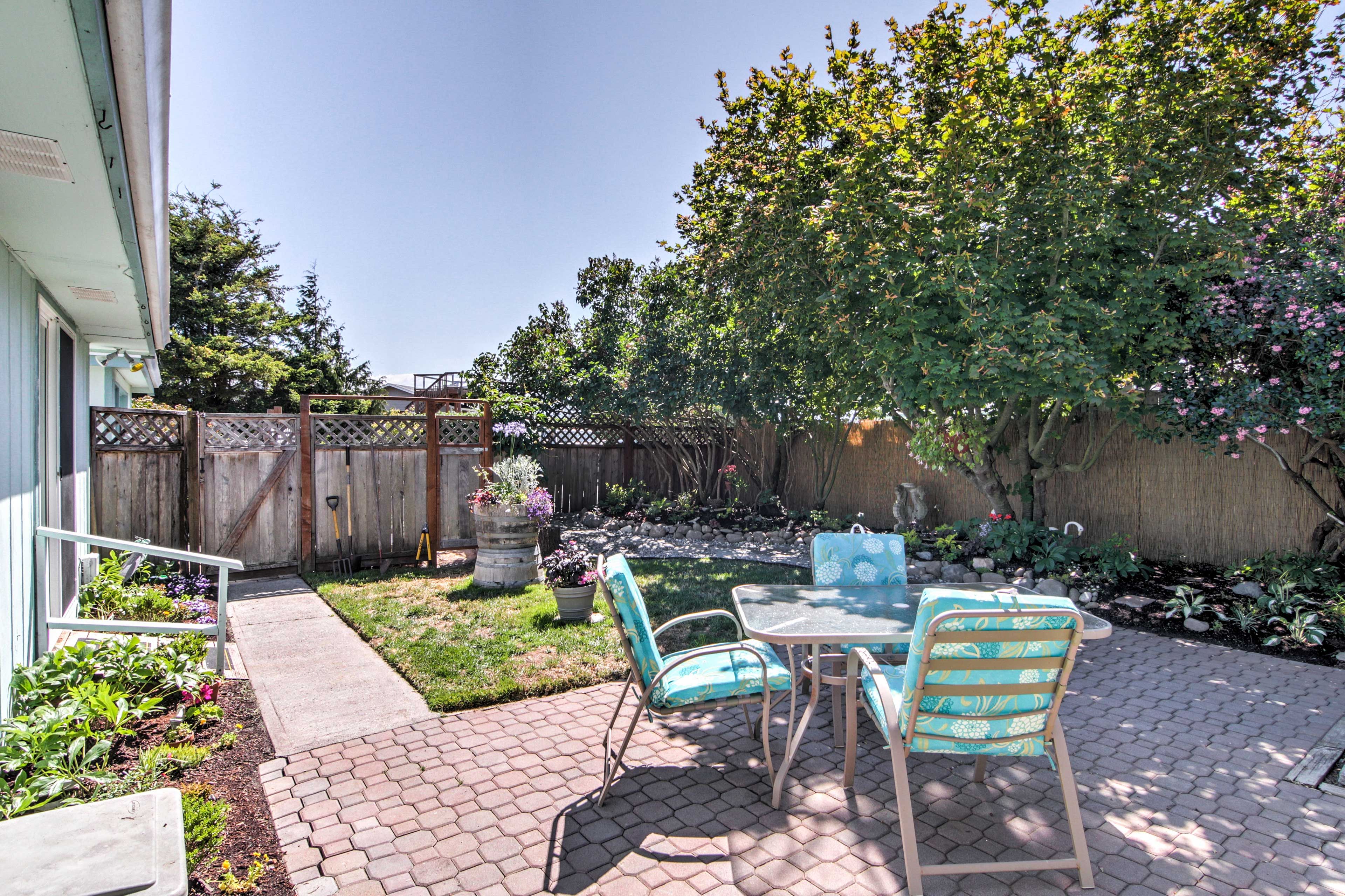 Sip a cold beverage at the outdoor table in the courtyard.