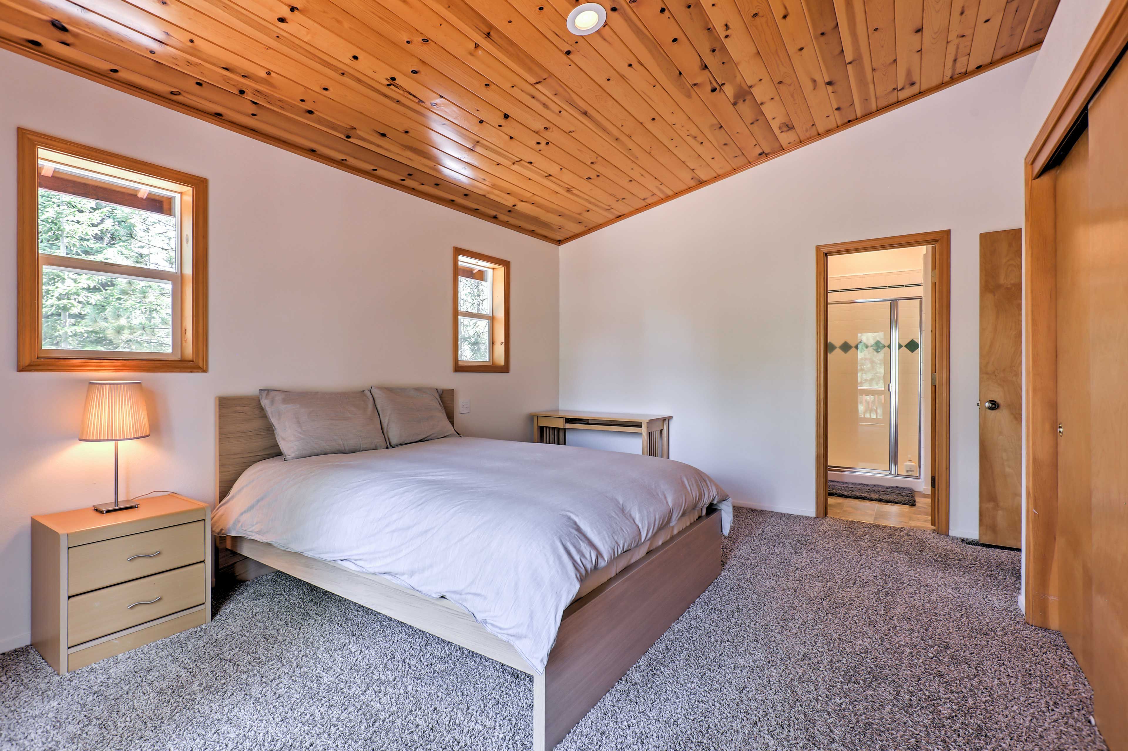 Revel in the wood paneled ceilings, natural light, and en-suite master bath.
